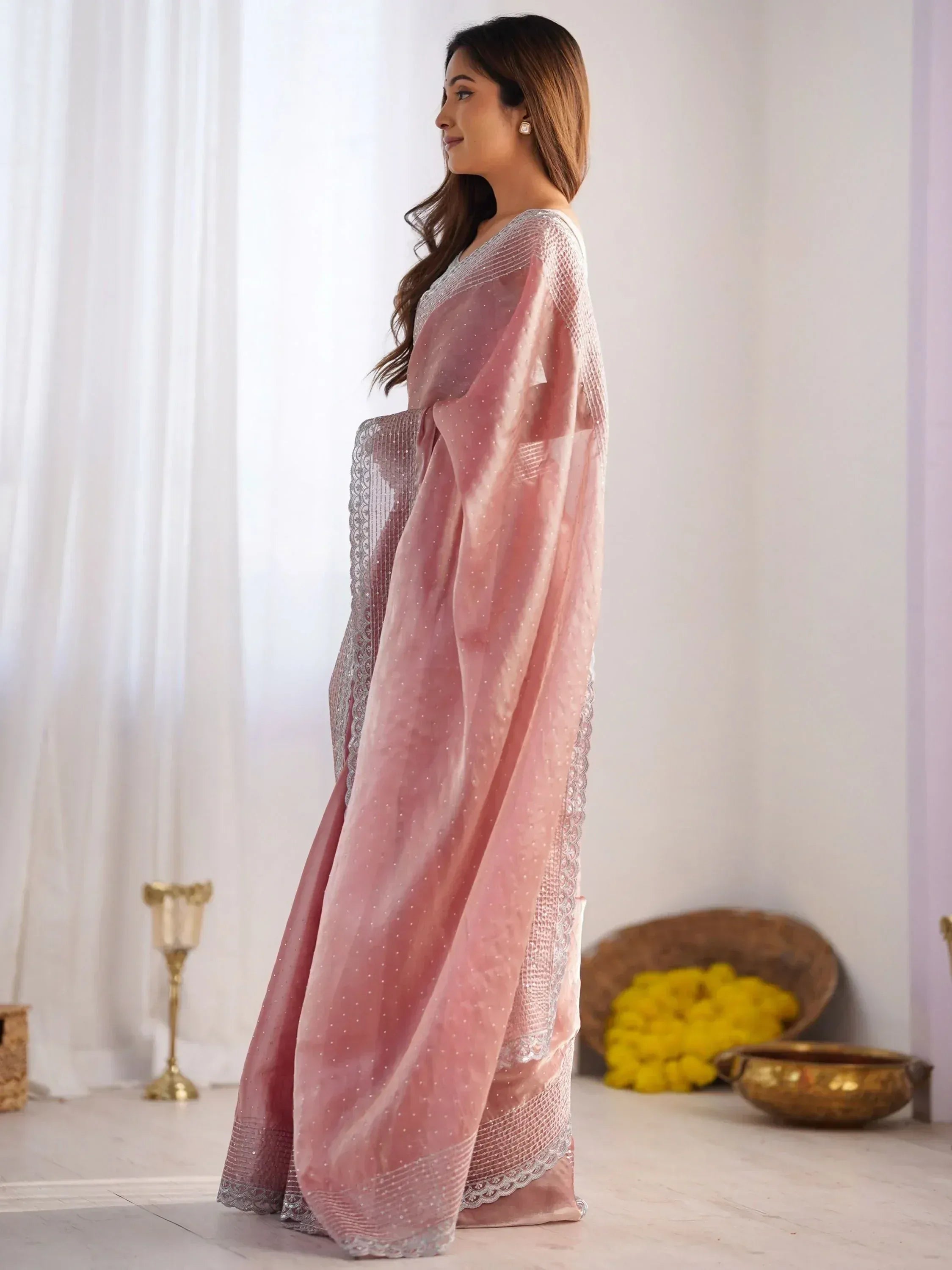 Pink embroidered saree with silver lace, perfect for Indian ethnic wear and festive occasions.
