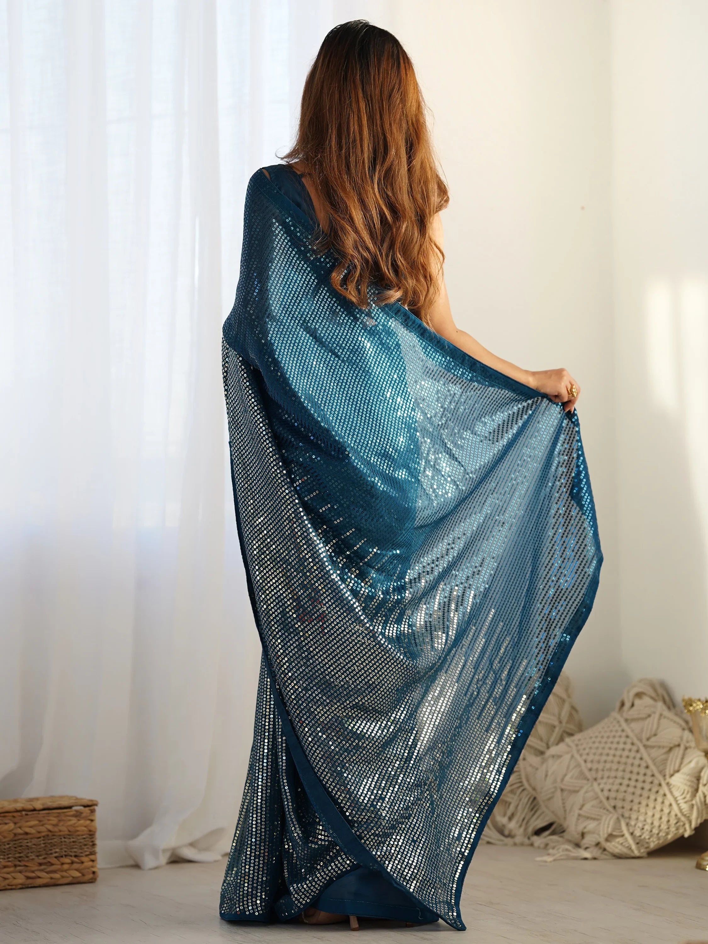 Stunning Teal Blue Sequins Georgette Party Wear Saree With Blouse