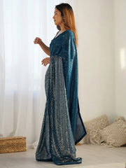 Stunning Teal Blue Sequins Georgette Party Wear Saree With Blouse