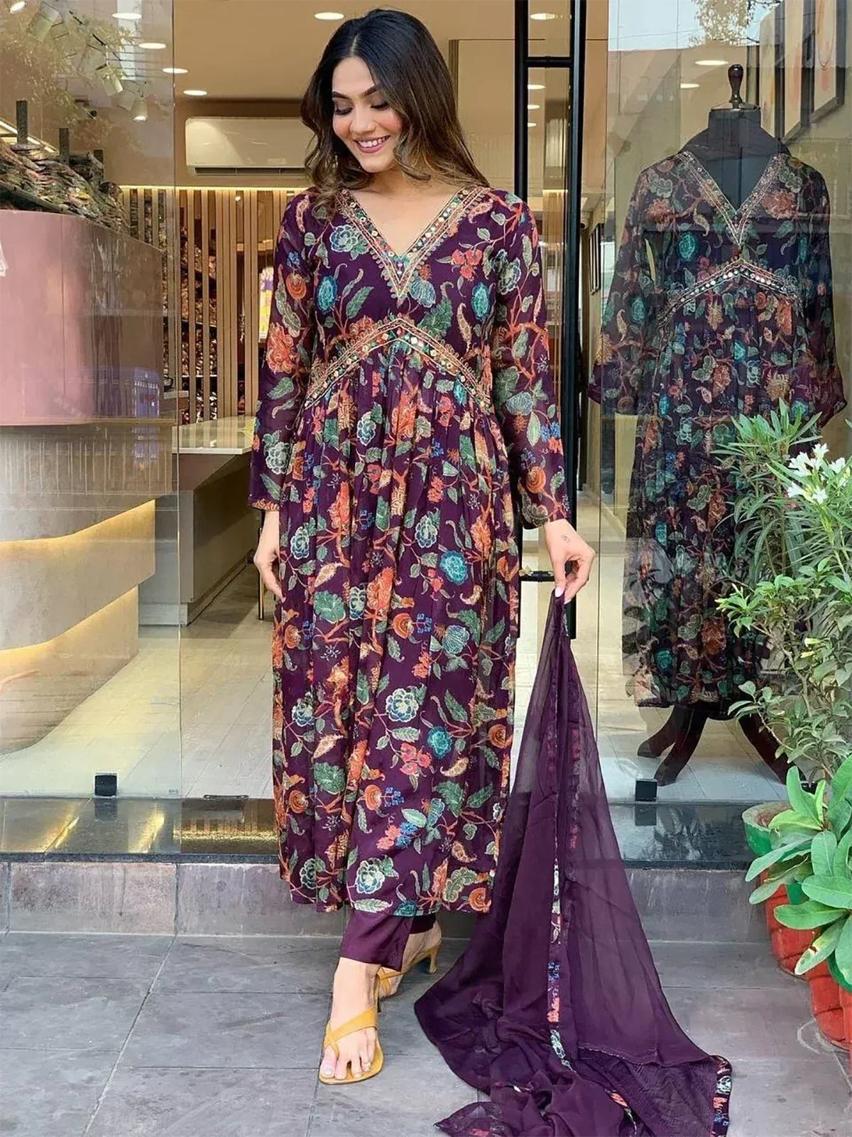 Purple floral printed ethnic gown with matching dupatta, perfect for Indian occasions and festive wear.