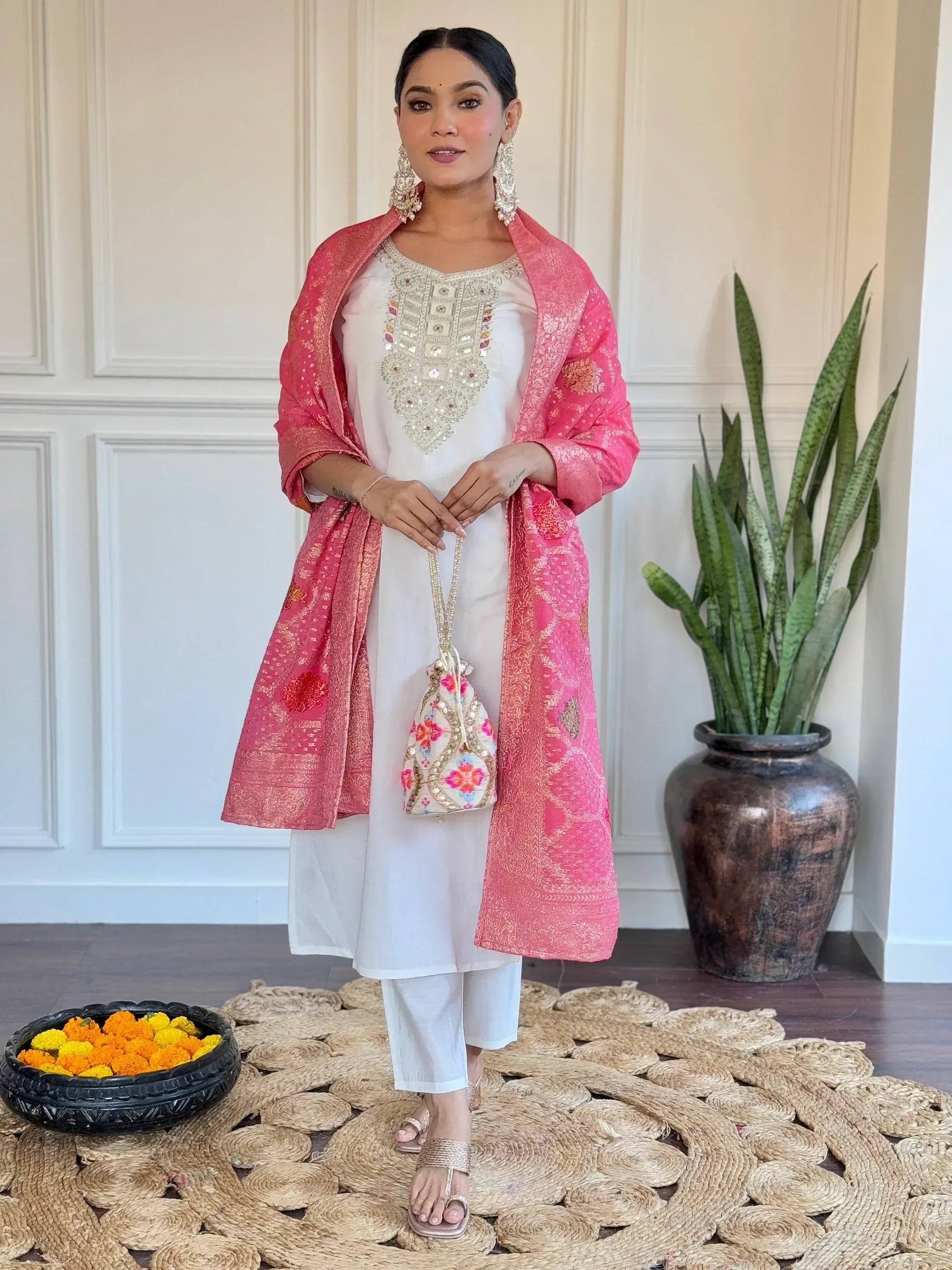 White embroidered kurta with pink floral dupatta, ethnic Indian wear for women