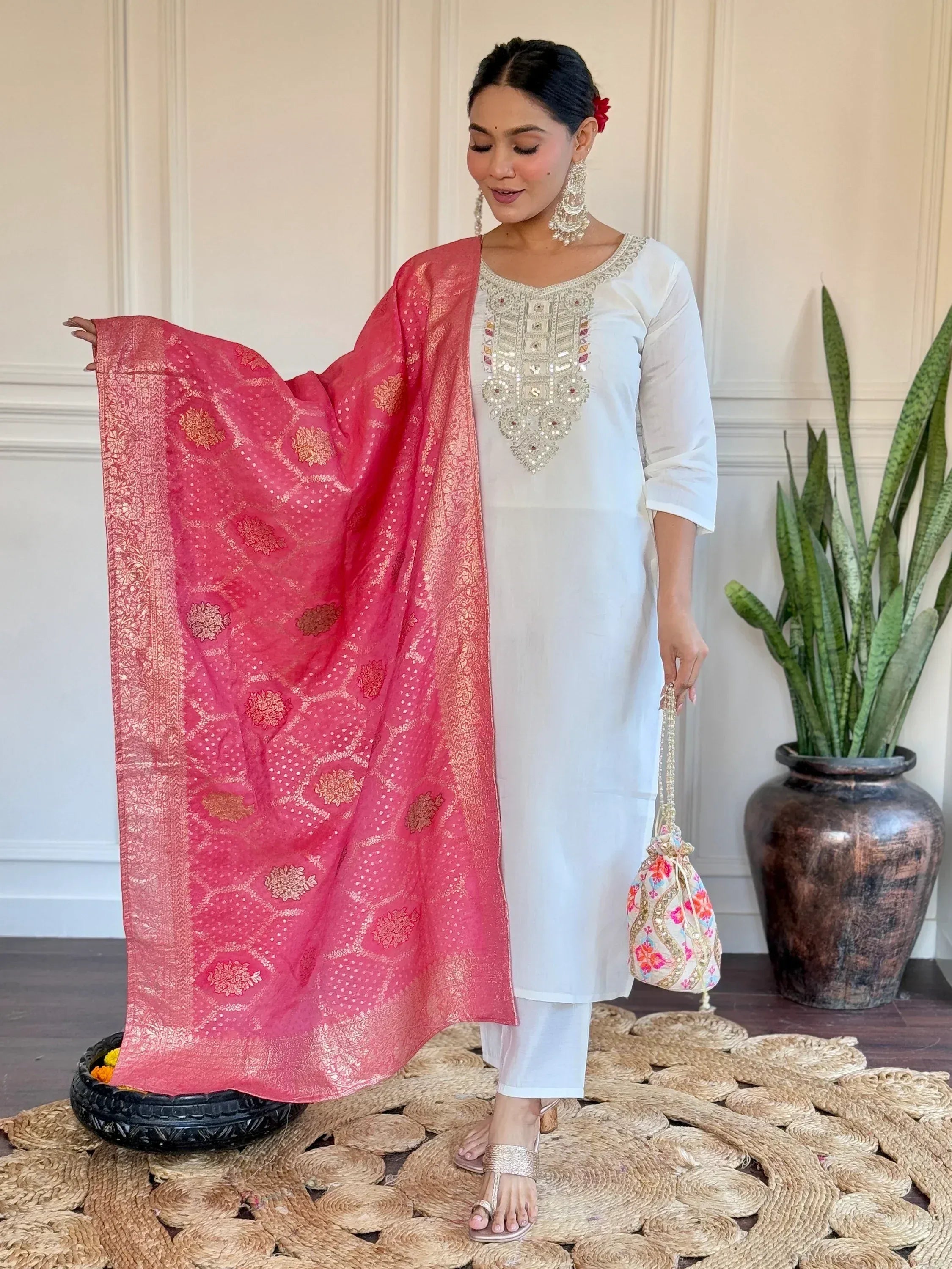 White embroidered kurta with pink floral dupatta, ethnic Indian wear for women