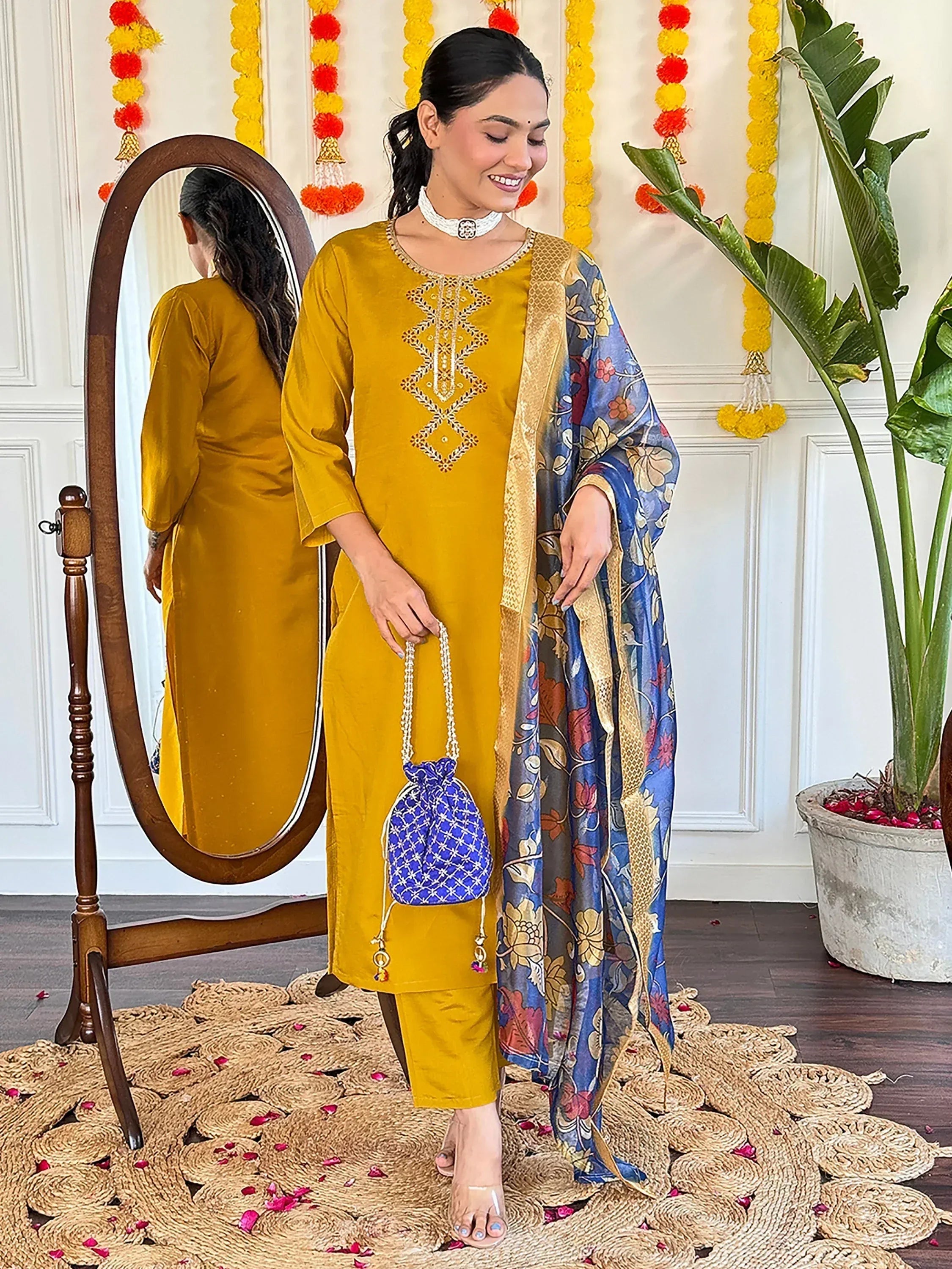 Mustard yellow embroidered kurta set with floral dupatta, perfect for Indian ethnic wear occasions