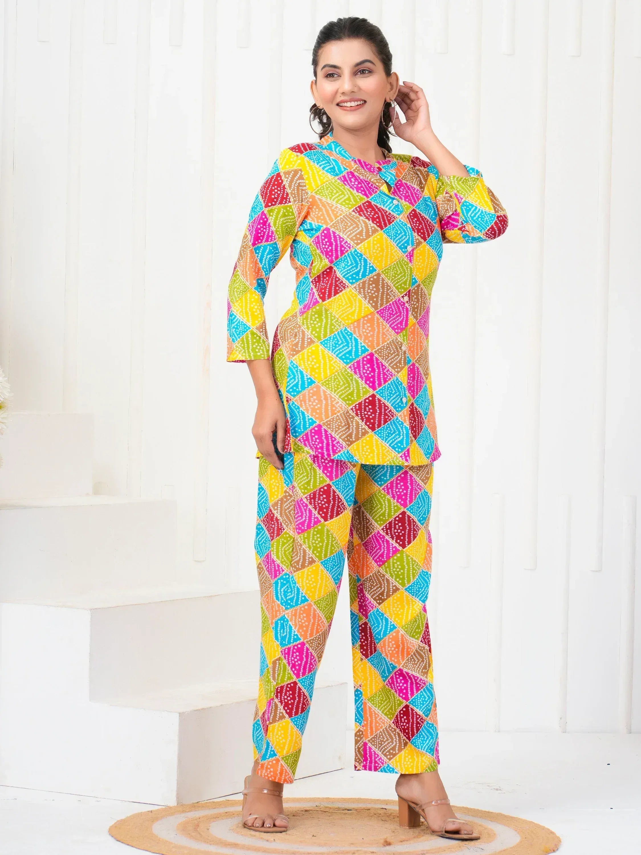 Colorful printed ethnic salwar kameez set with geometric pattern, perfect for casual wear