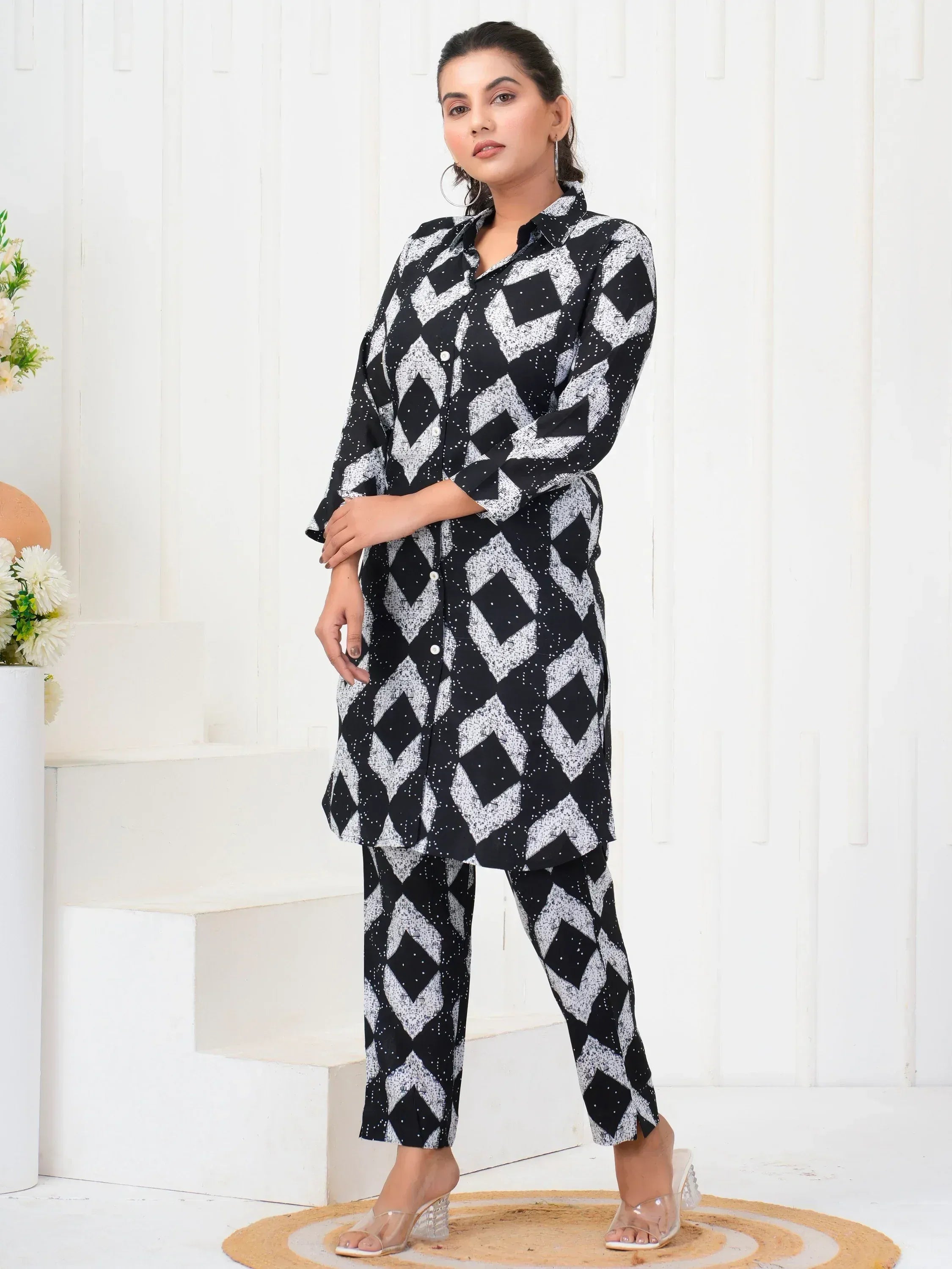 Black and white geometric print kurta set with matching pants, stylish ethnic wear for women