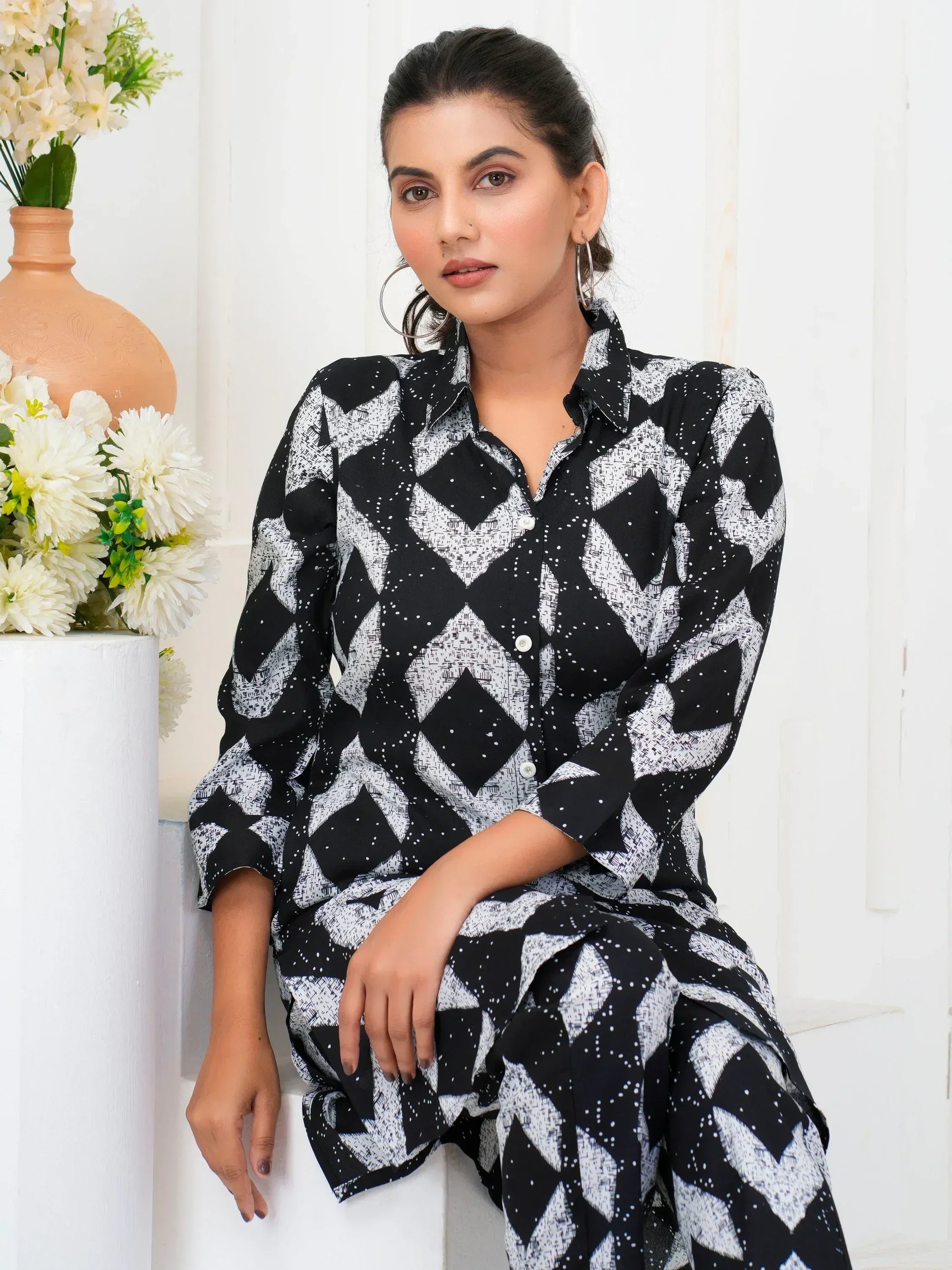 Black and white geometric print kurta with button front, styled for ethnic wear