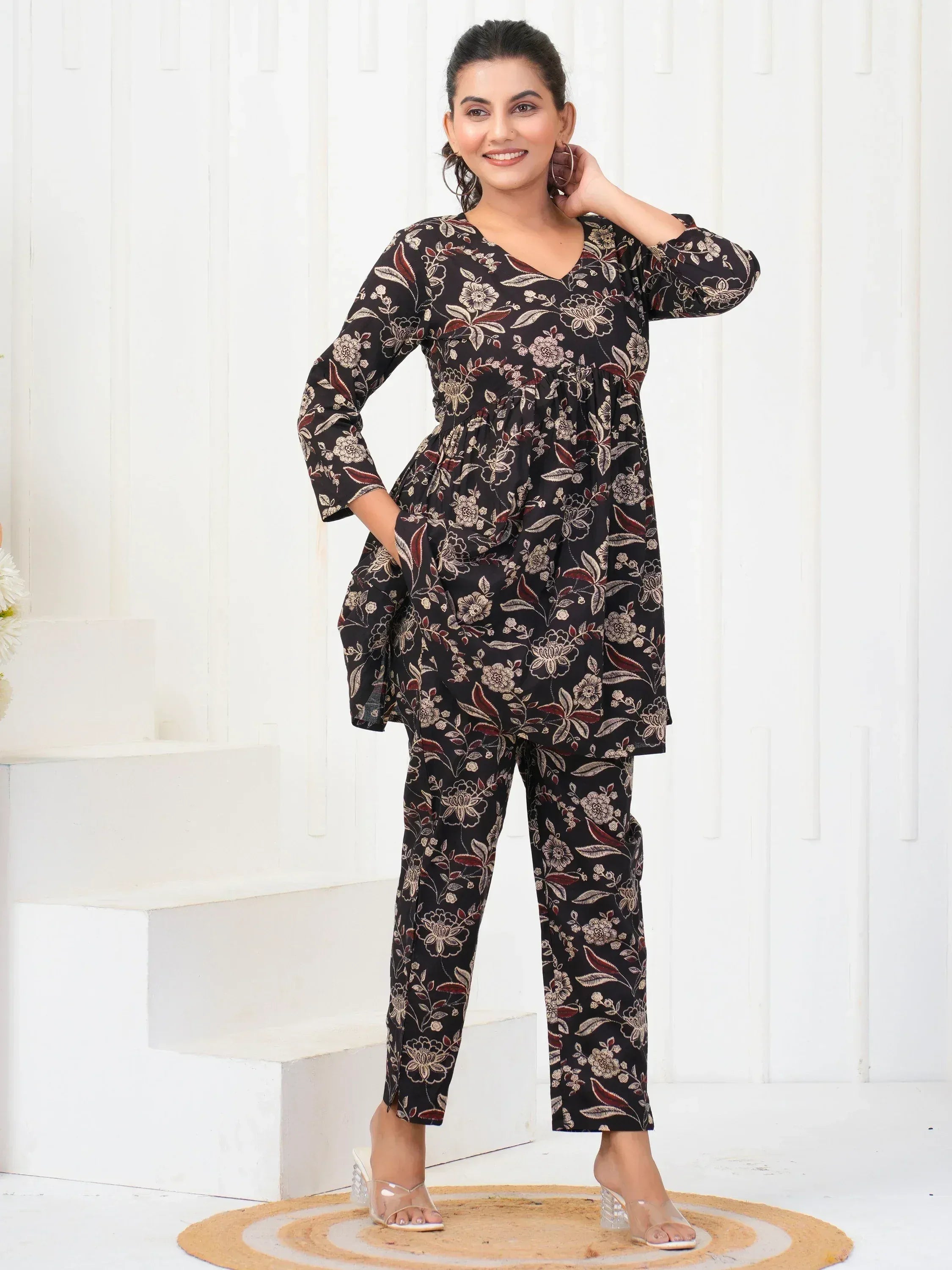 Black floral printed ethnic kurta set with matching pants for women