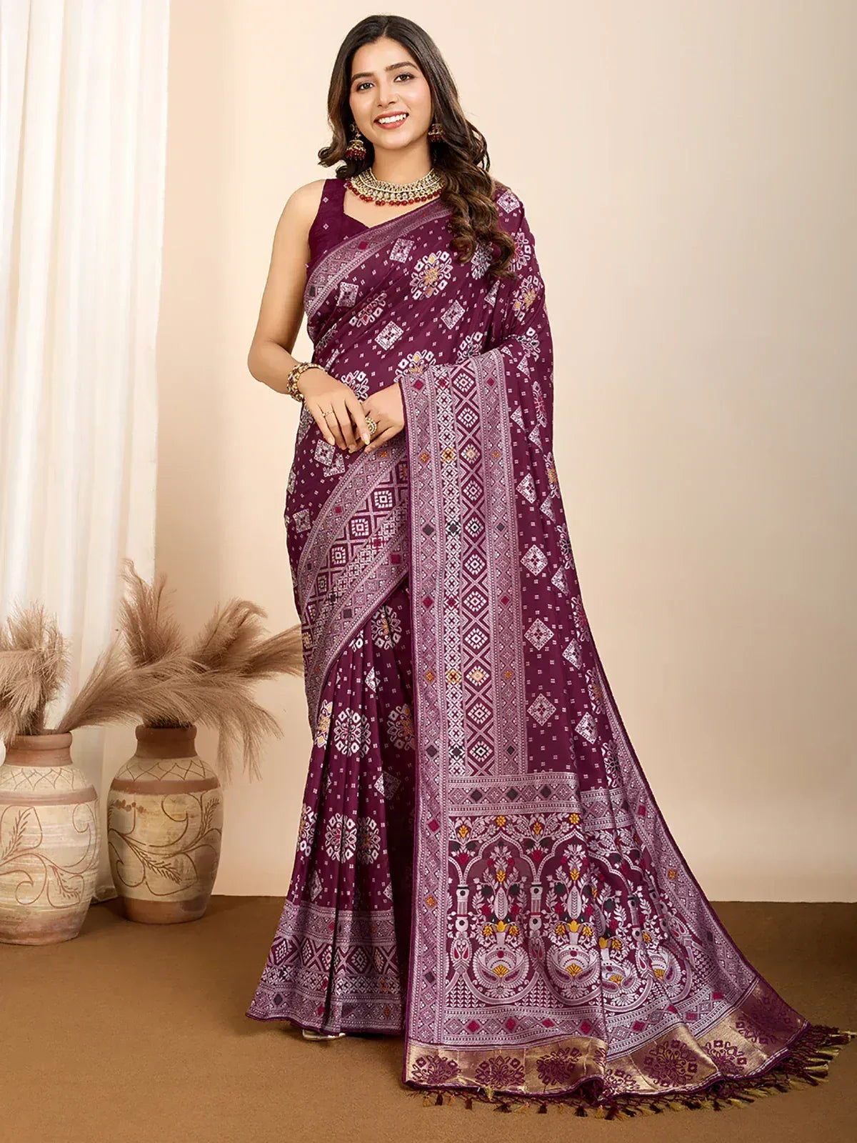 Elegant purple printed saree with intricate geometric and floral designs, perfect for ethnic occasions.