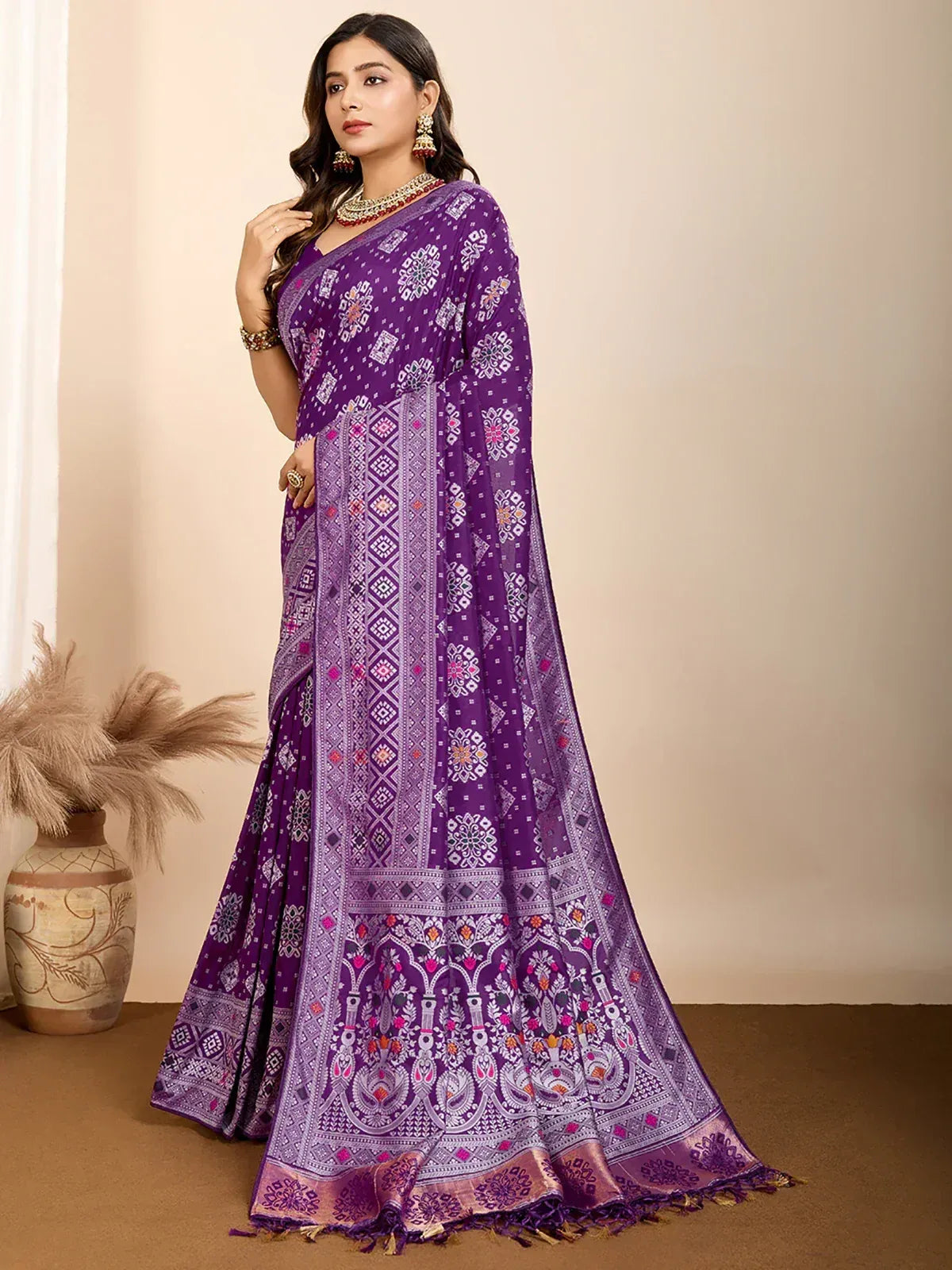 Purple printed ethnic saree with intricate floral and geometric patterns, perfect for Indian occasions