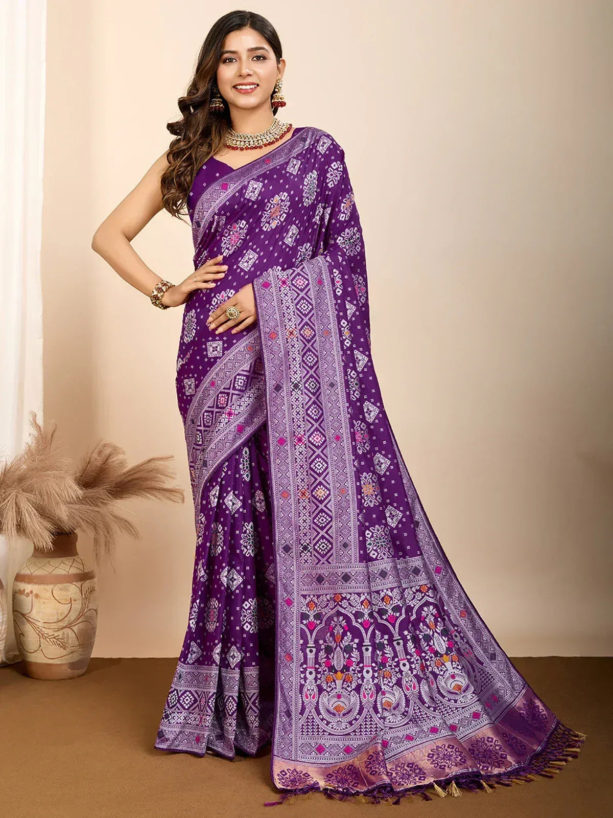Purple printed saree with intricate ethnic patterns, perfect for Indian festive occasions and traditional wear.