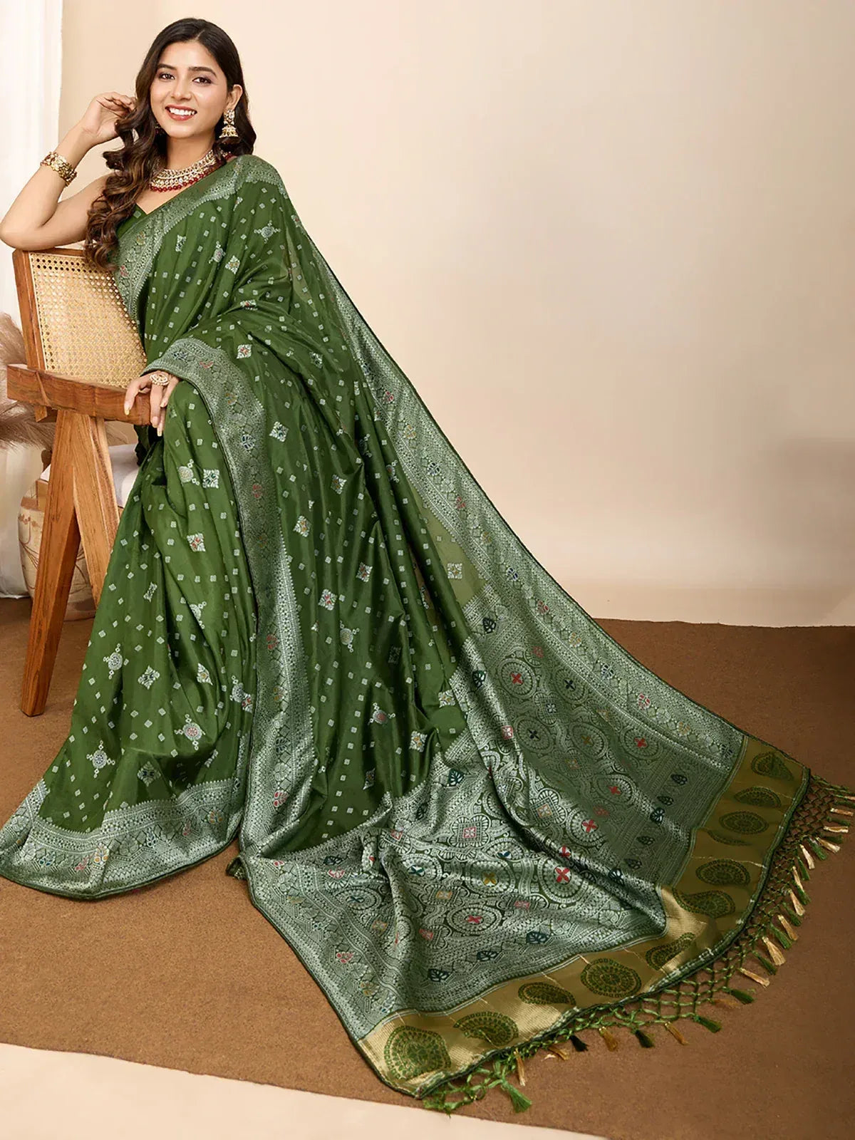 Green printed saree with intricate border and tassels, perfect for Indian ethnic wear occasions