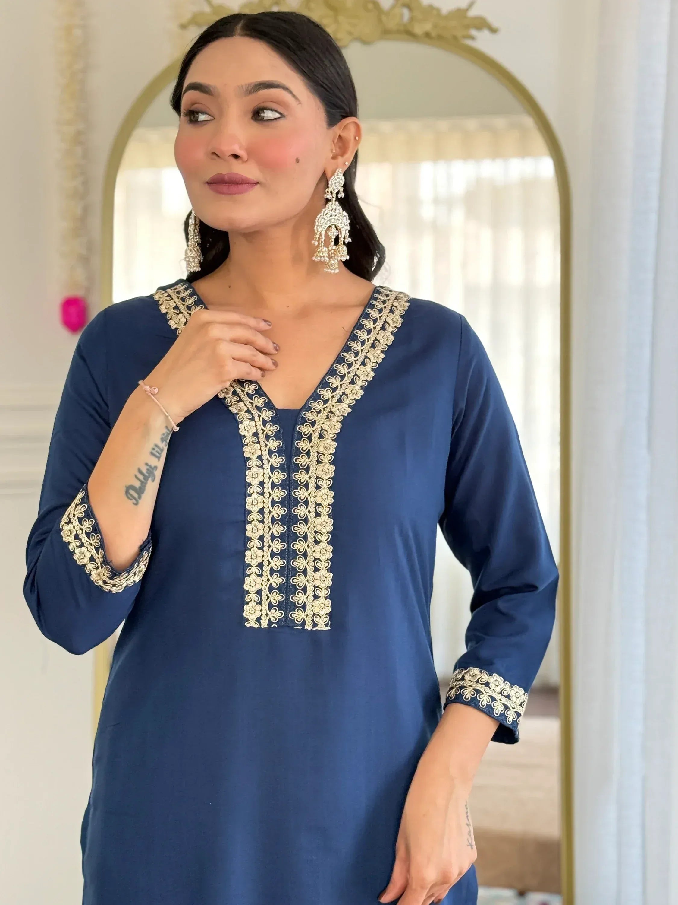 Navy blue ethnic kurti with gold floral embroidery, perfect for Indian wear