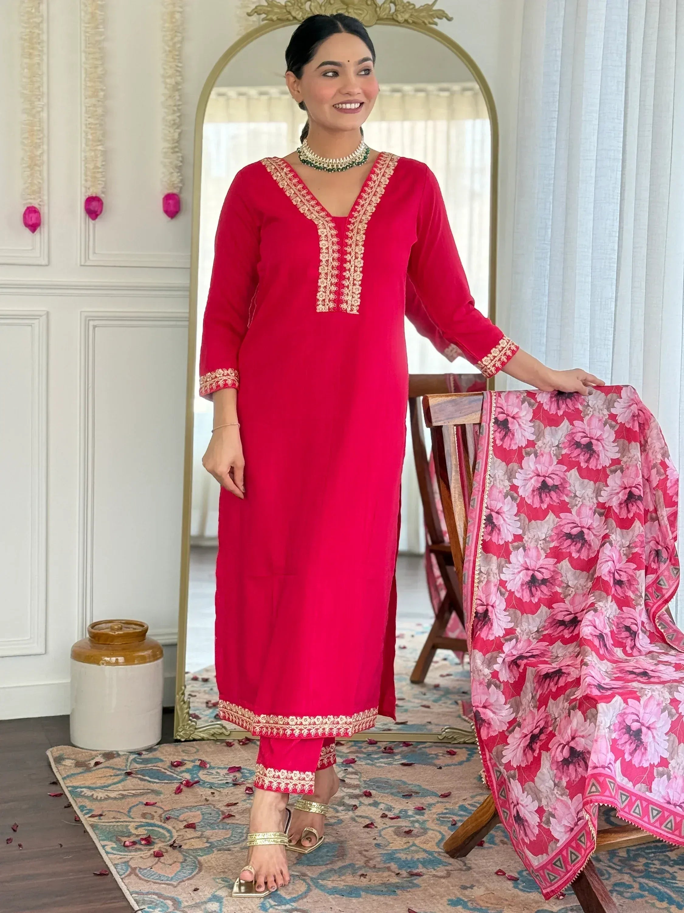 Vibrant red embroidered kurta with floral dupatta, perfect for Indian ethnic wear occasions.