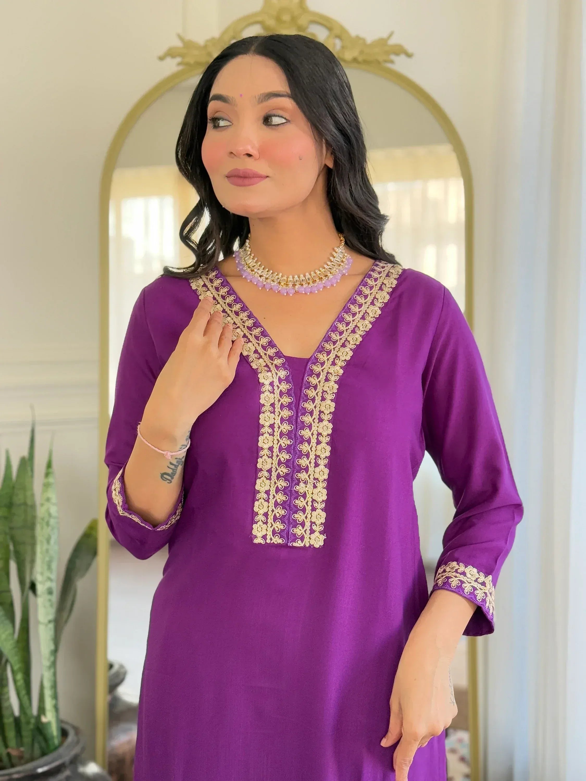 Purple ethnic kurti with gold floral embroidery, perfect for Indian wear and festive occasions.