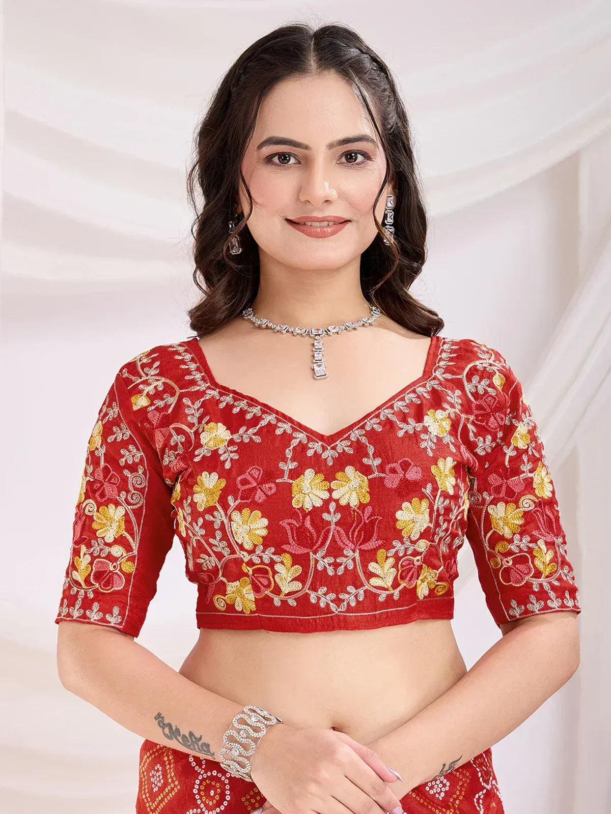 Red floral embroidered blouse with V-neck, perfect for ethnic wear and designer lehenga choli sets