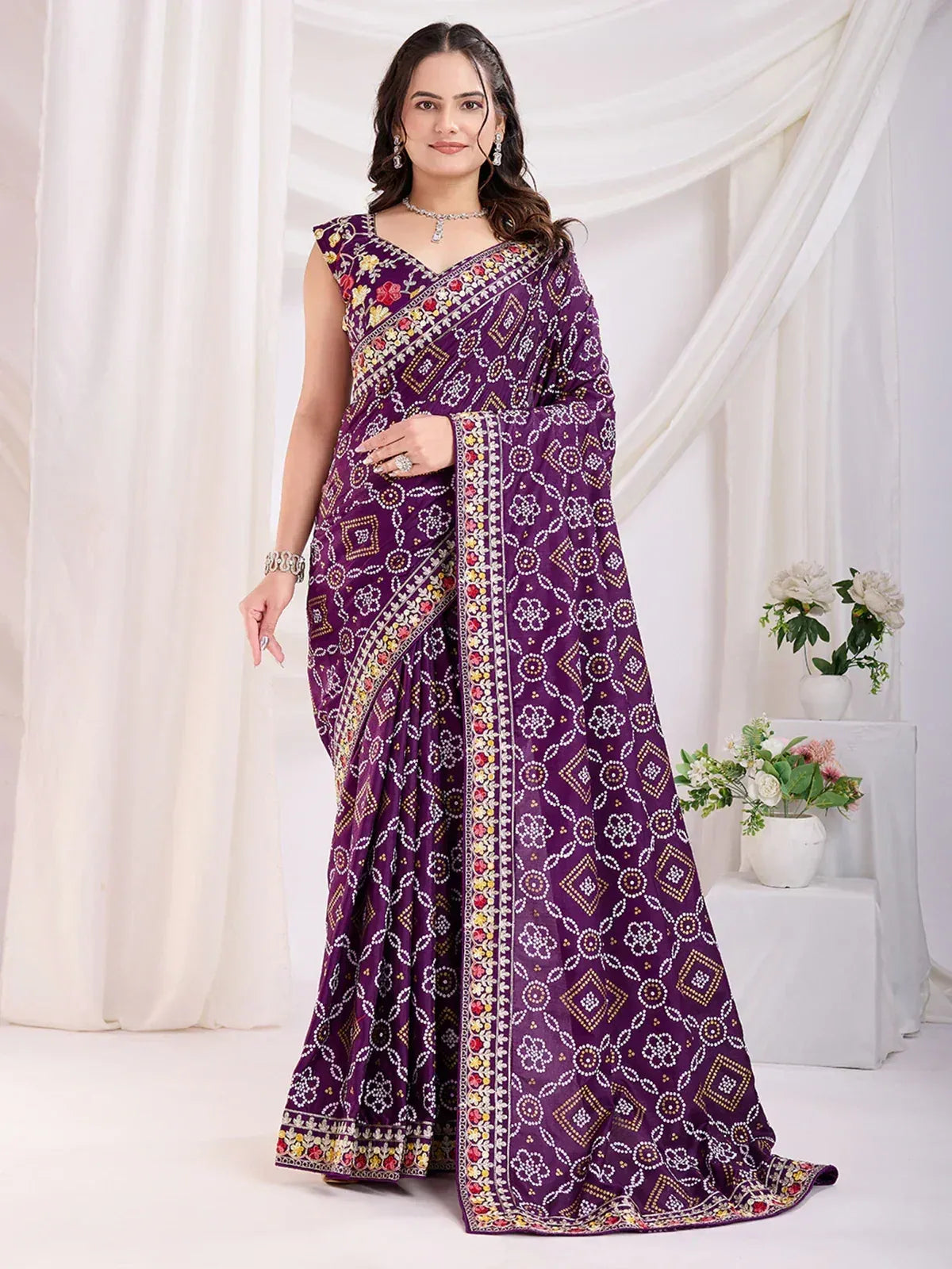 Purple printed saree with floral and geometric patterns, perfect for Indian ethnic wear occasions