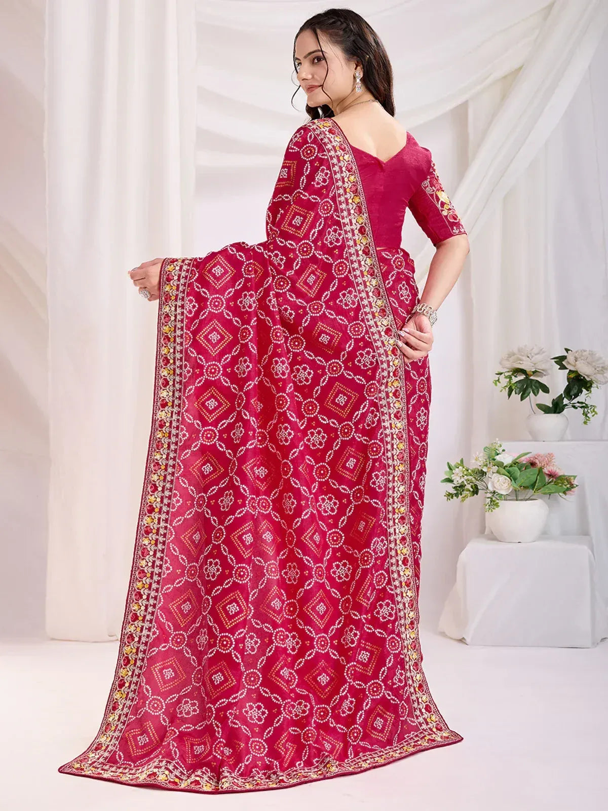 Red ethnic saree with white and gold geometric print, perfect for Indian occasions and festive wear.