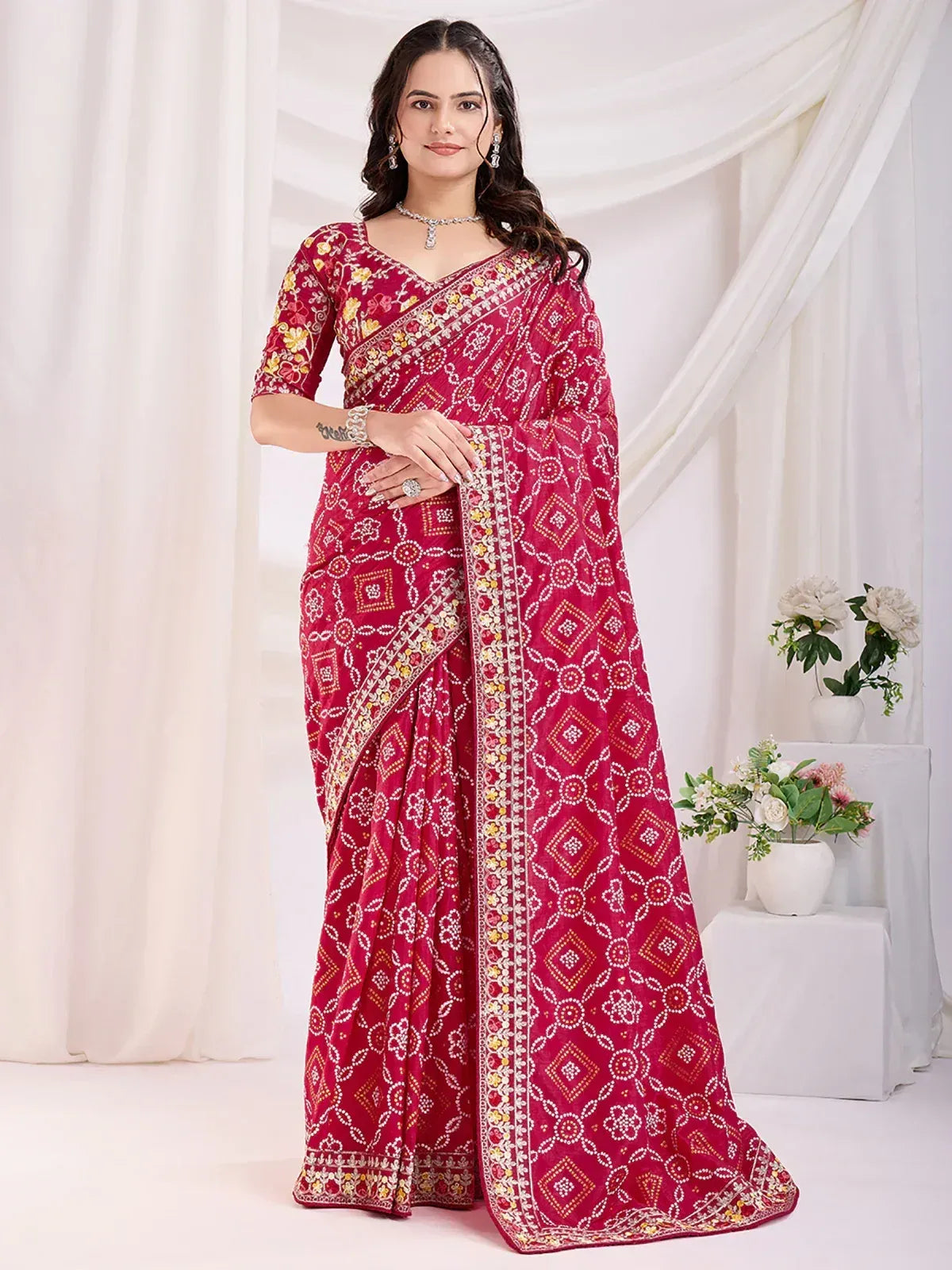 Red printed saree with floral and geometric embroidery, perfect for Indian ethnic occasions
