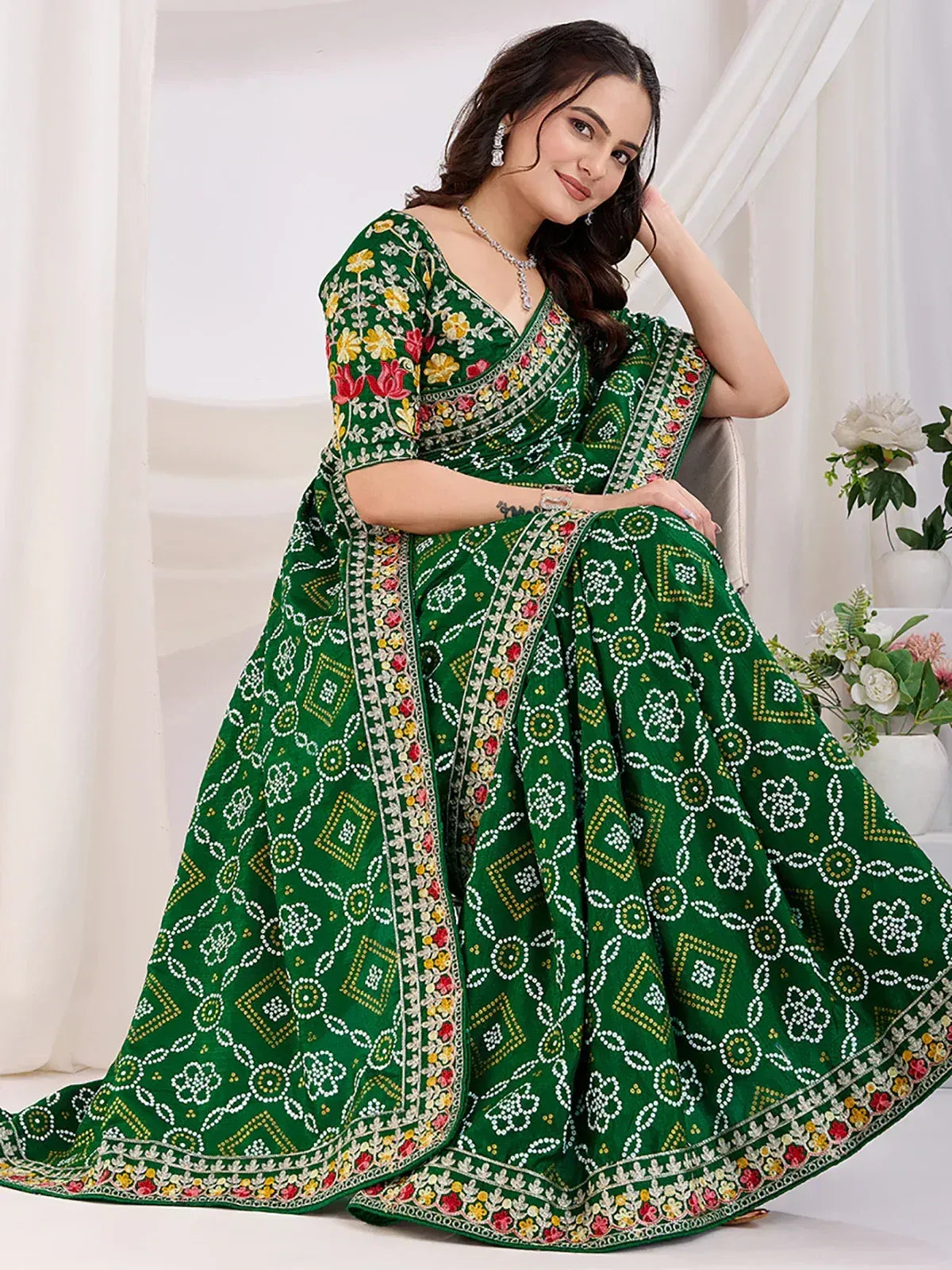 Green embroidered lehenga choli with floral and geometric patterns, perfect for ethnic occasions