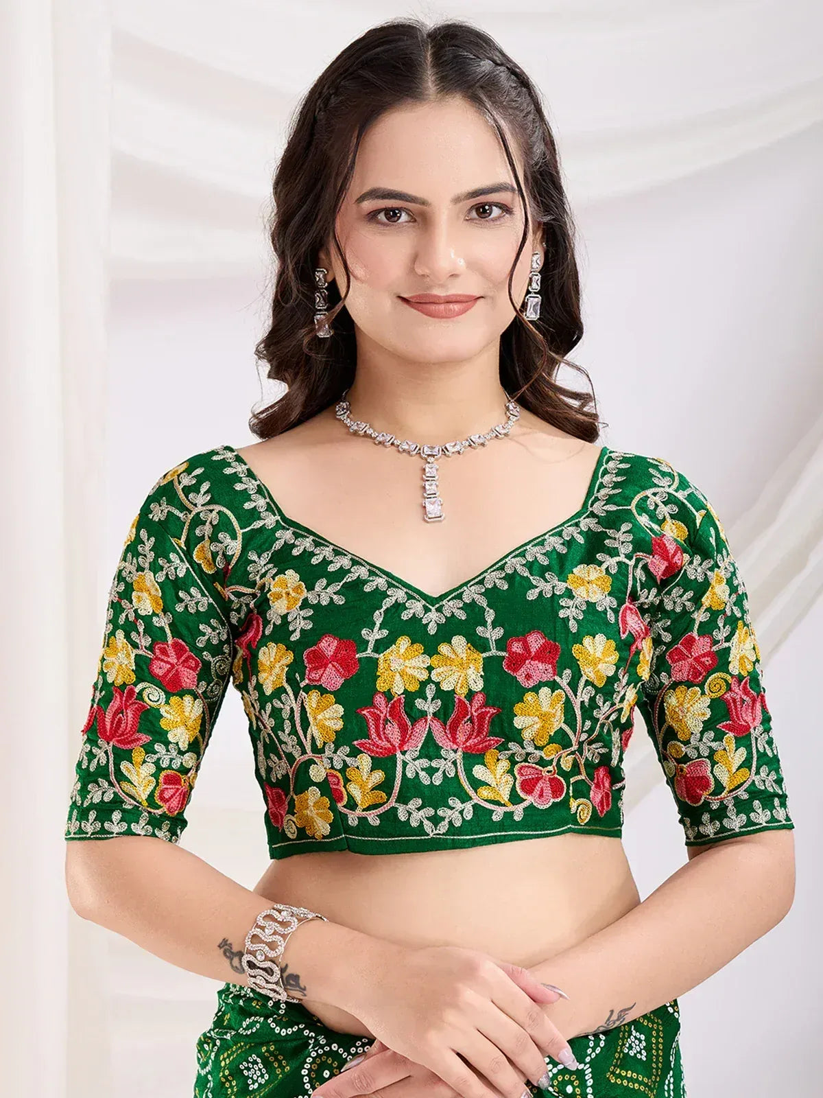 Green floral embroidered crop top with V-neck, perfect for Indian ethnic wear and designer lehenga choli sets.