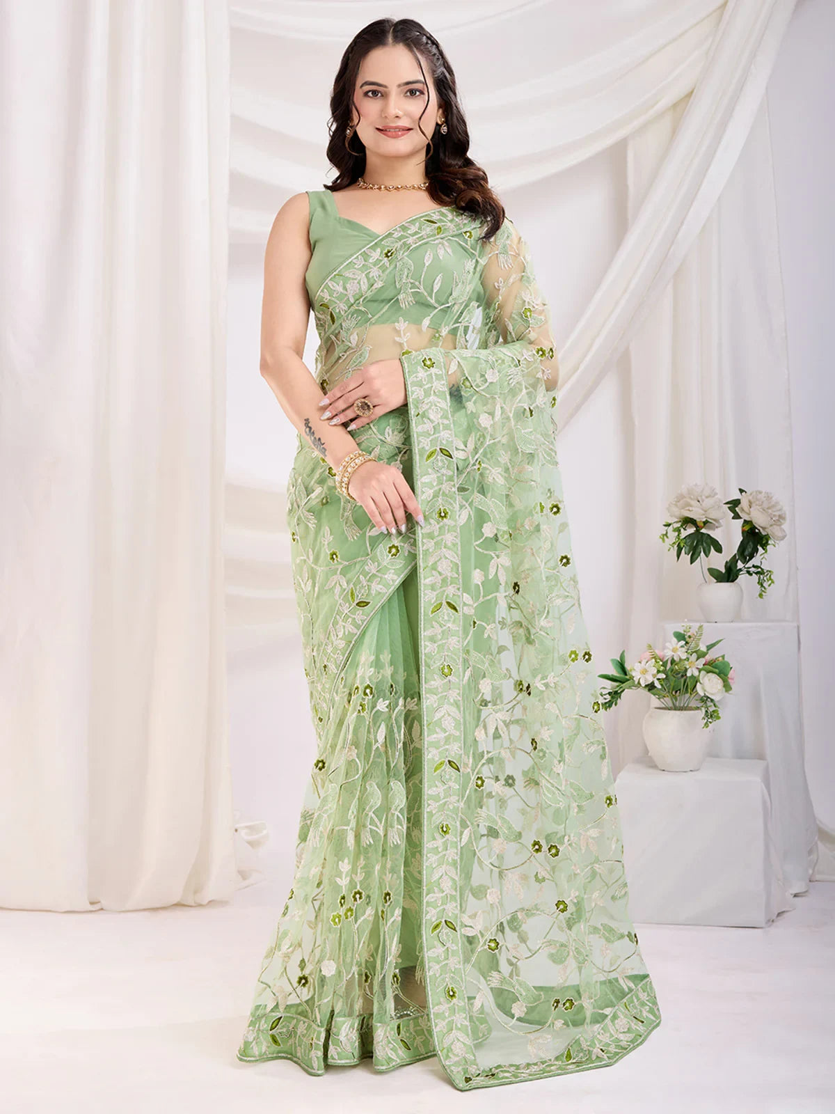 Pretty Pista Green Thread Embroidered Net Event Wear Saree
