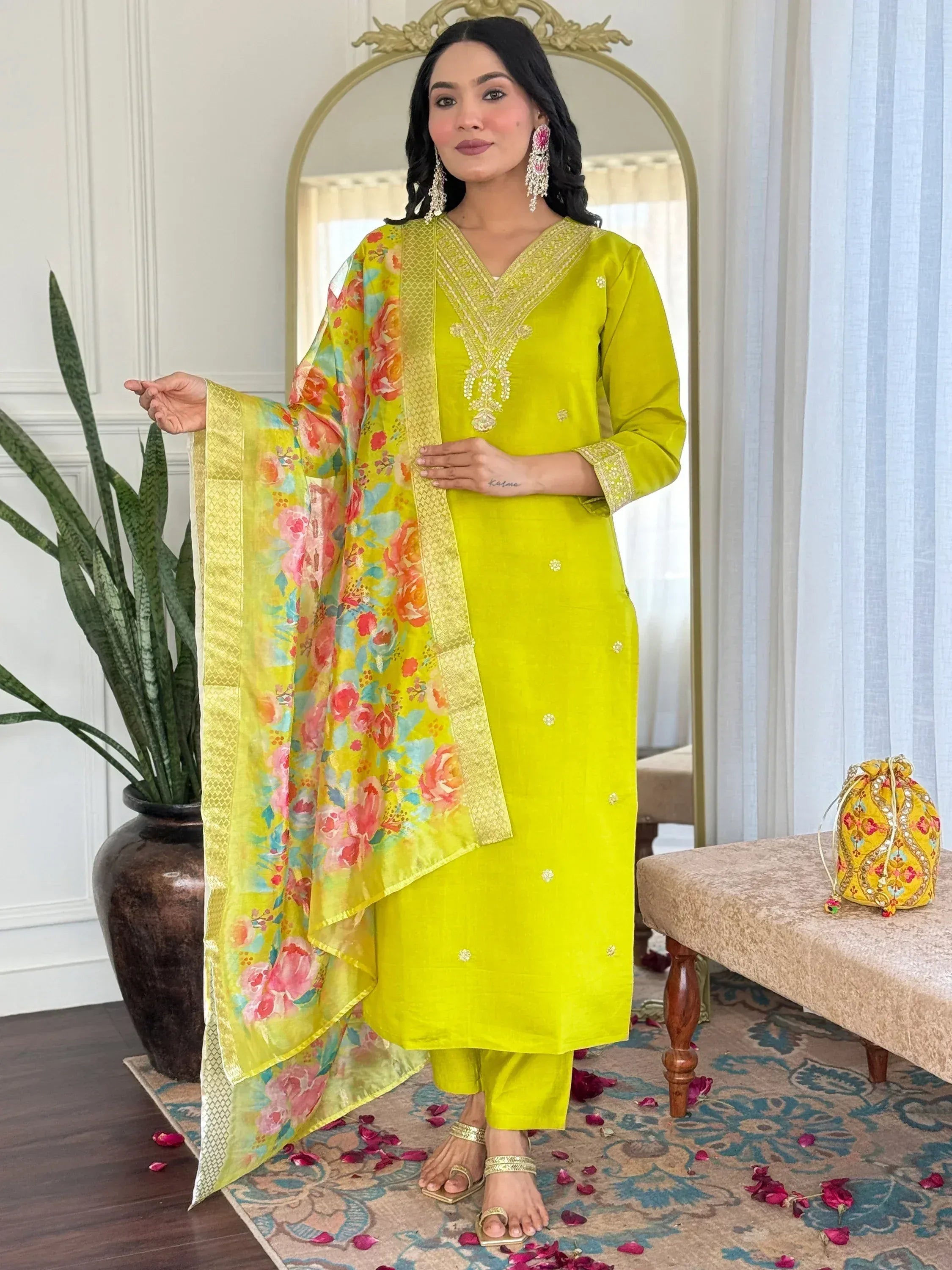 Bright yellow embroidered salwar kameez with floral dupatta, perfect for Indian ethnic wear occasions.
