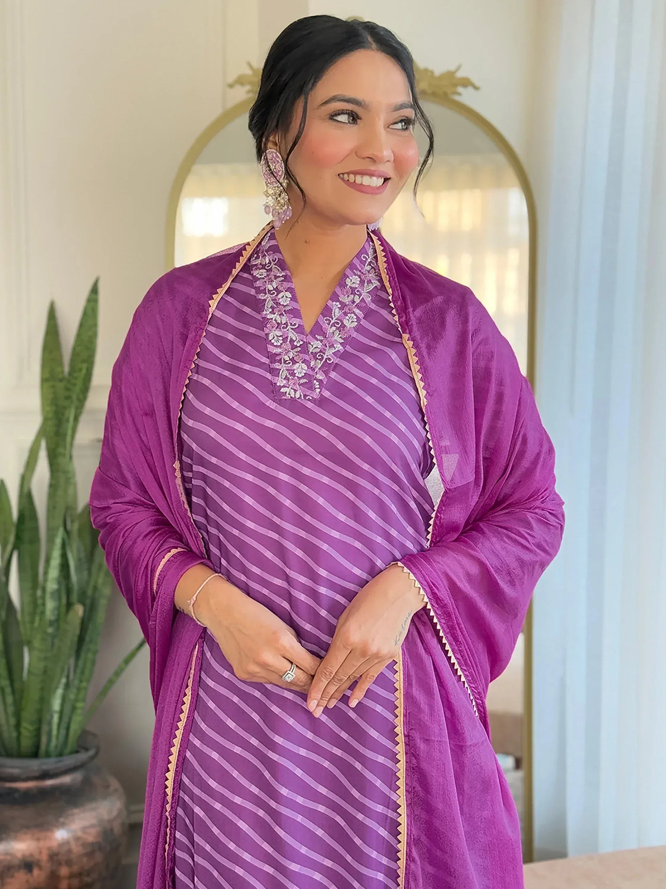 Purple striped ethnic gown with velvet dupatta and floral embroidery, perfect for Indian occasions
