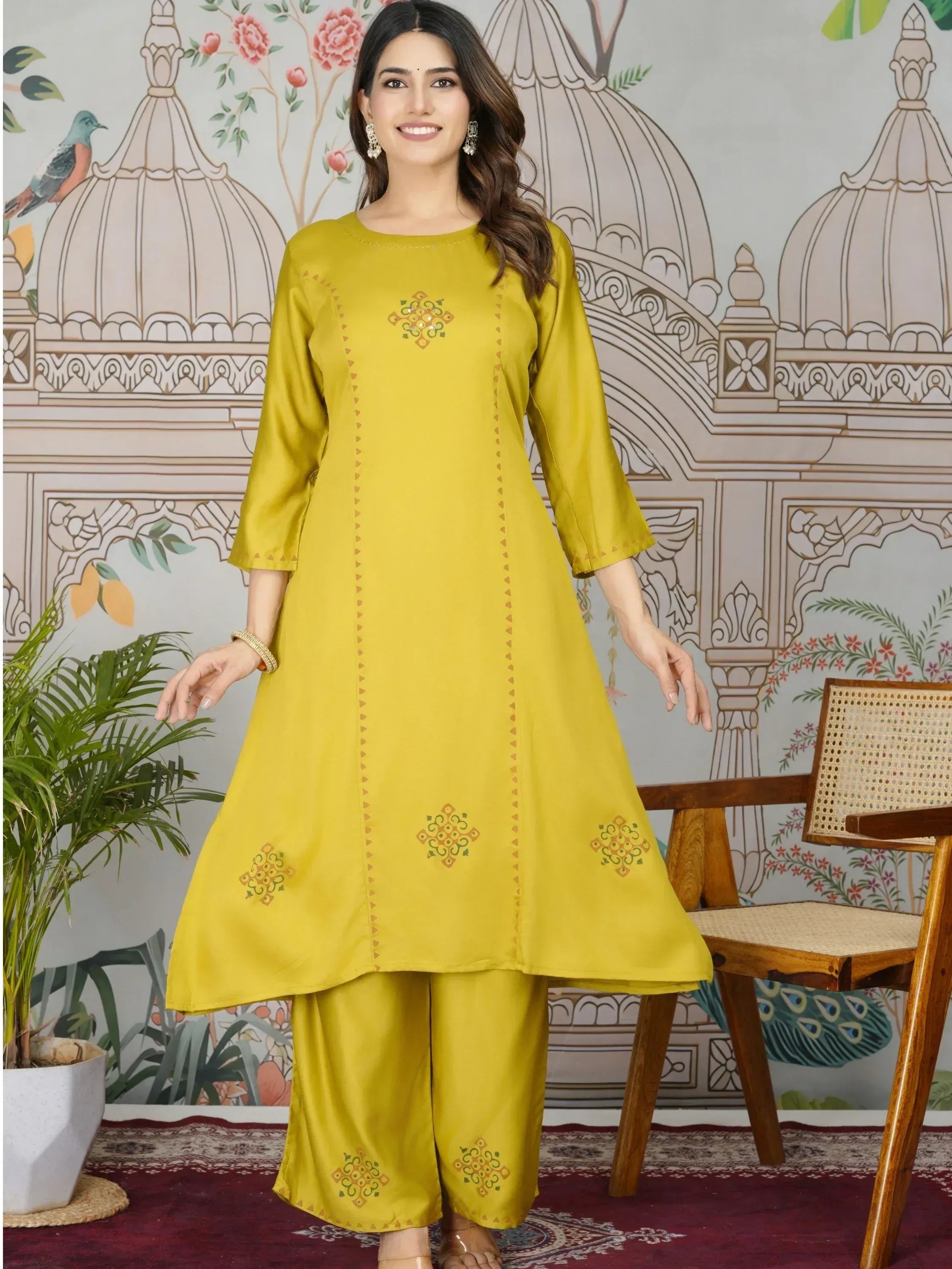 Yellow embroidered ethnic kurta set with palazzo pants, perfect for Indian festive occasions