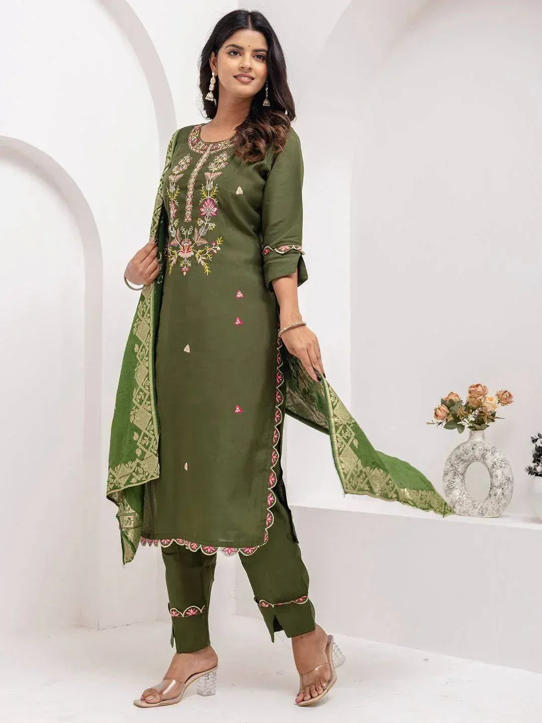 Olive green embroidered salwar kameez with matching dupatta, floral detailing, and scalloped hem for ethnic wear