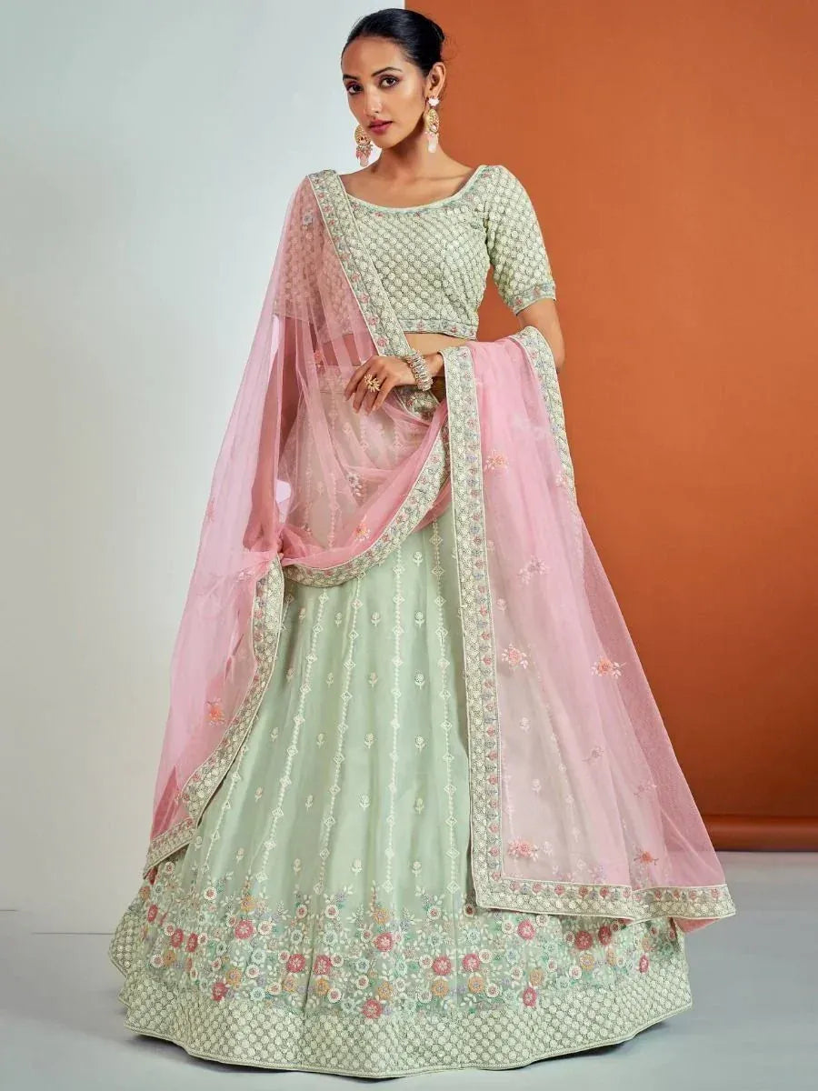 Mint green embroidered lehenga choli with pink dupatta, Indian ethnic wear for weddings and festivals