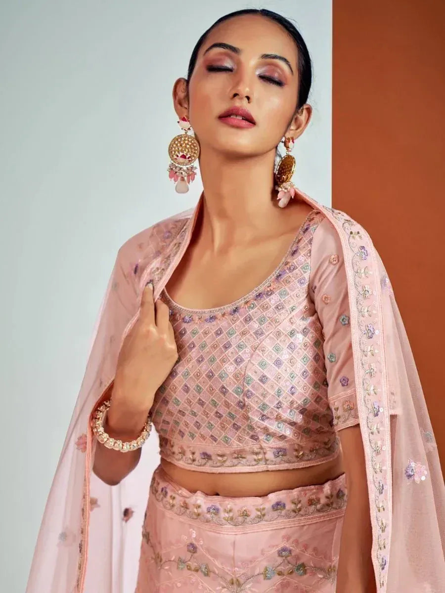 Pink embroidered lehenga choli with floral dupatta, perfect for Indian ethnic wear occasions