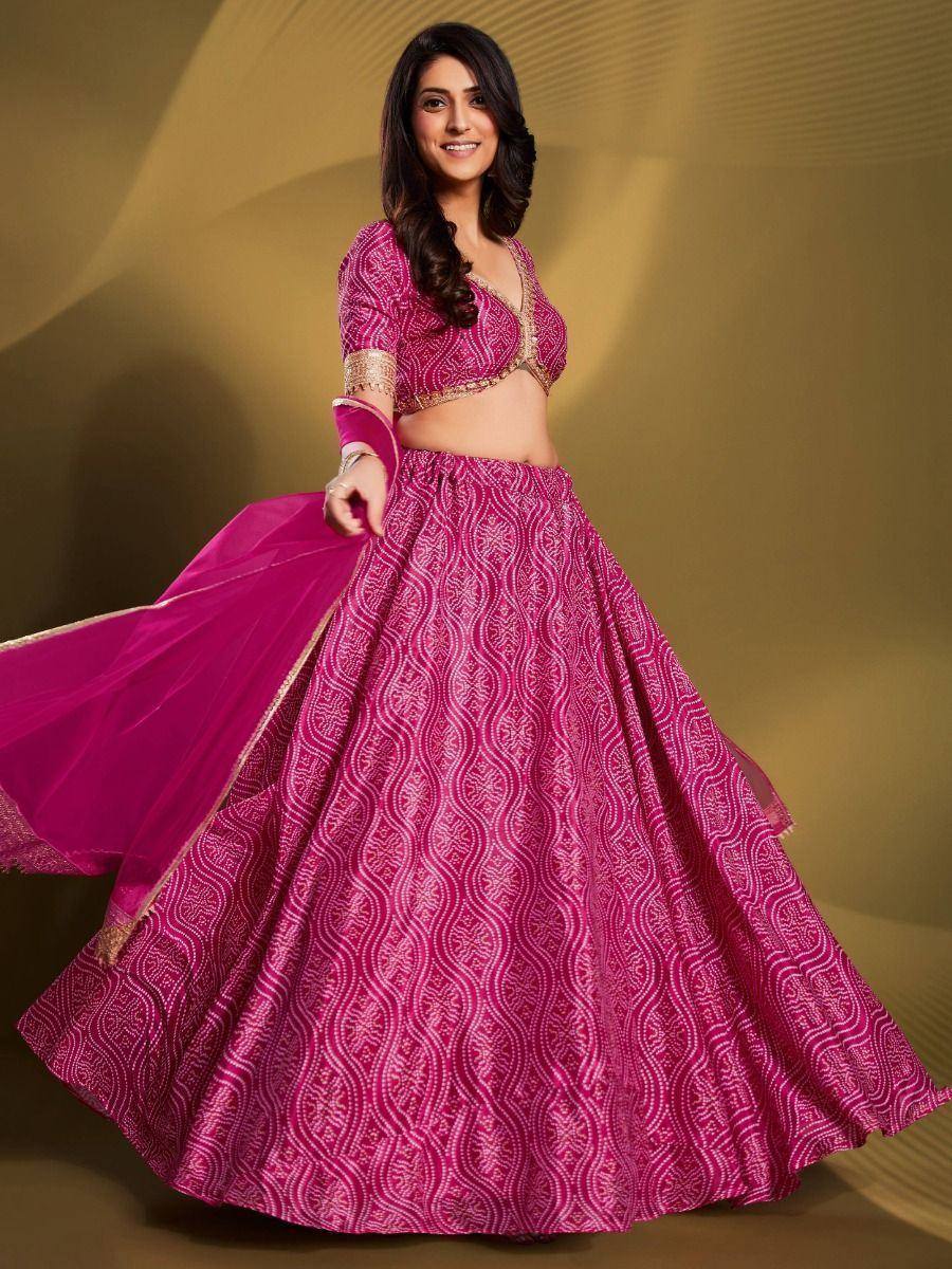 Pink printed lehenga choli with gold trim, ethnic Indian wear for women