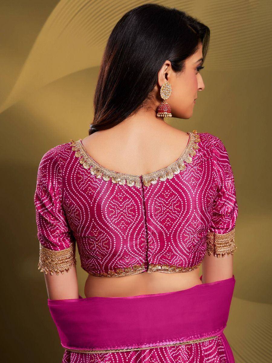 Pink designer lehenga choli with gold embroidery, back view, ethnic wear
