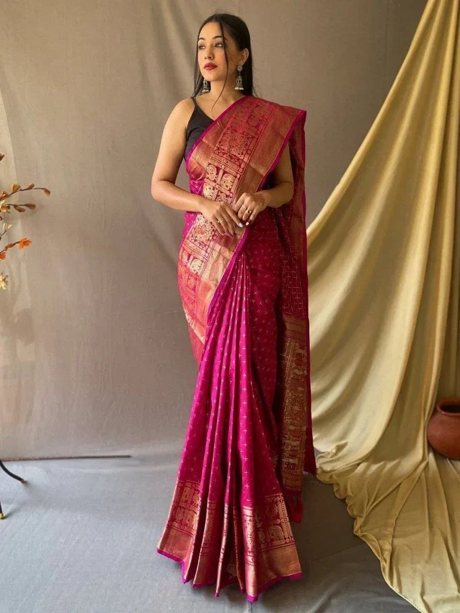Elegant pink silk saree with gold temple border, perfect for Indian ethnic wear occasions