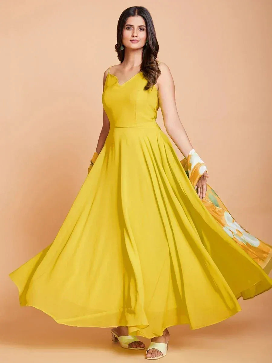 Yellow ethnic gown with floral dupatta, perfect for Indian festive occasions and weddings