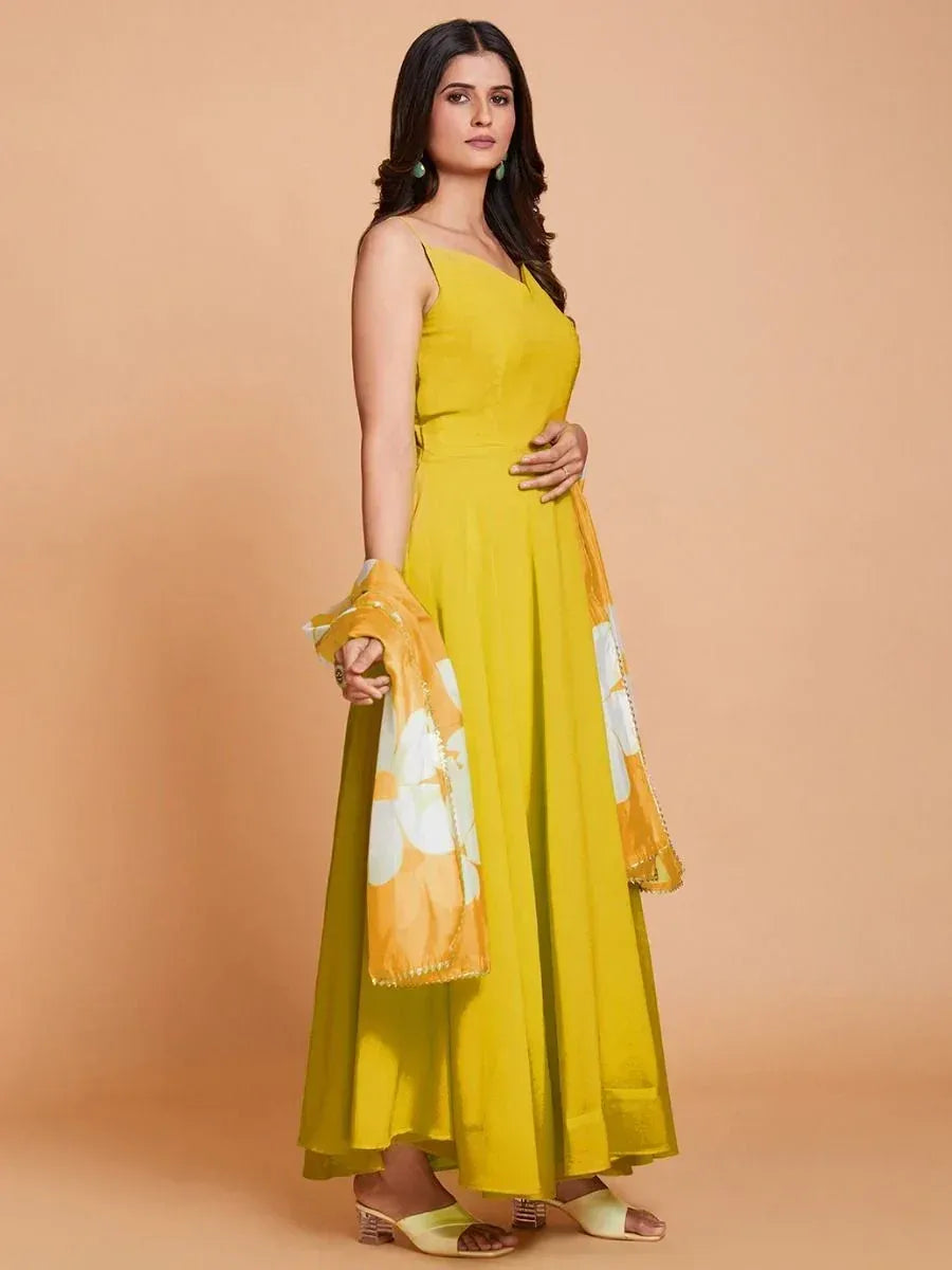 Yellow ethnic gown with floral dupatta, stylish Indian wear for women