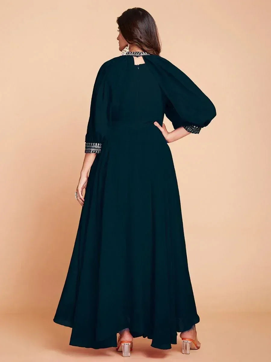 Elegant dark green ethnic gown with embroidered sleeves and back neckline, perfect for Indian occasions