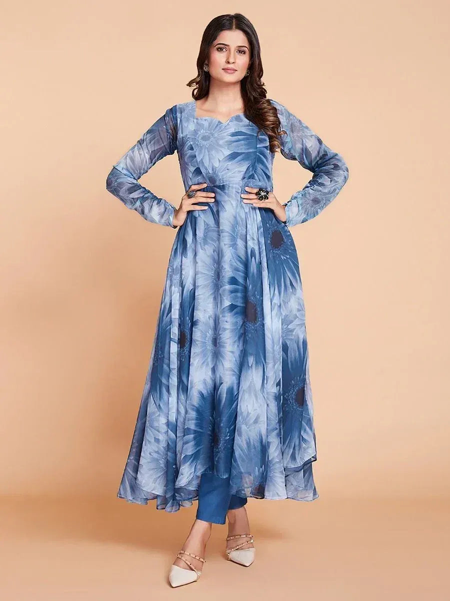 Blue floral print ethnic gown with long sleeves and flared skirt, paired with matching pants