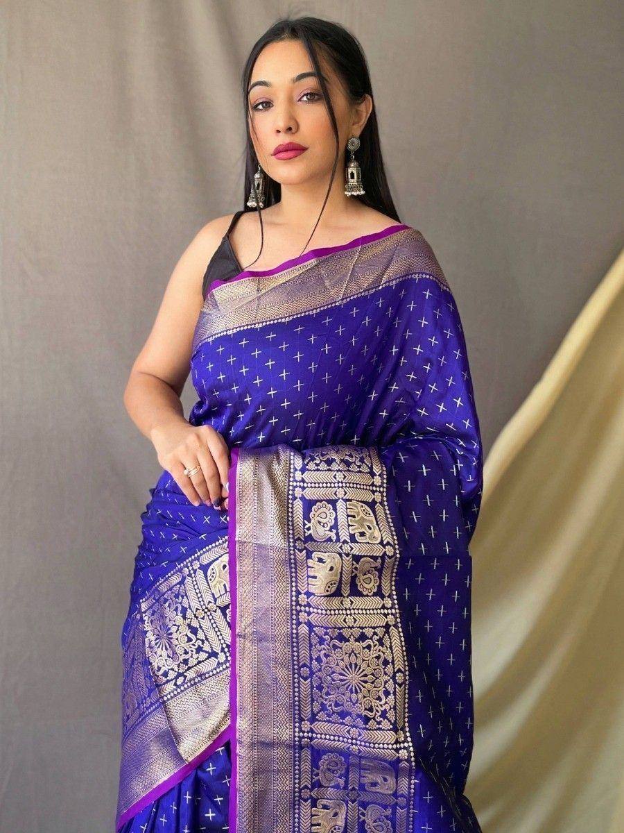Purple ethnic saree with gold elephant motifs and silver border, perfect for Indian occasions