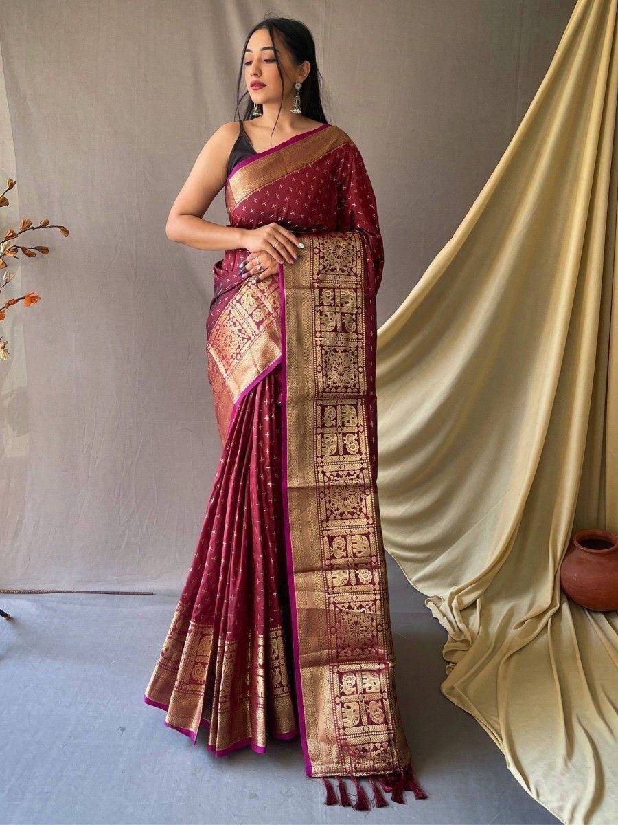 Maroon silk saree with gold zari border and temple motifs, perfect for Indian ethnic occasions