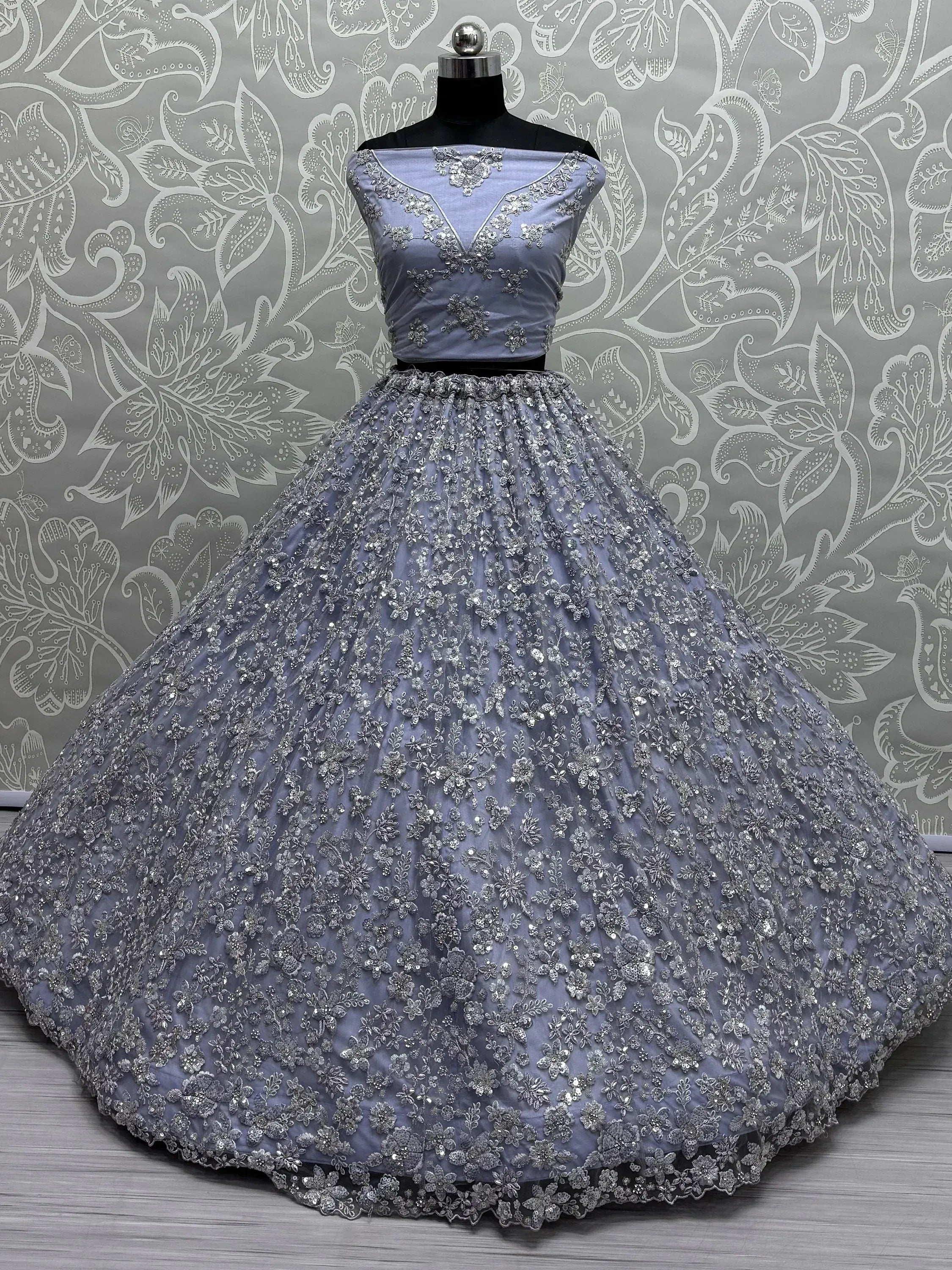 Lavender designer lehenga choli with silver floral embroidery, perfect for weddings and parties