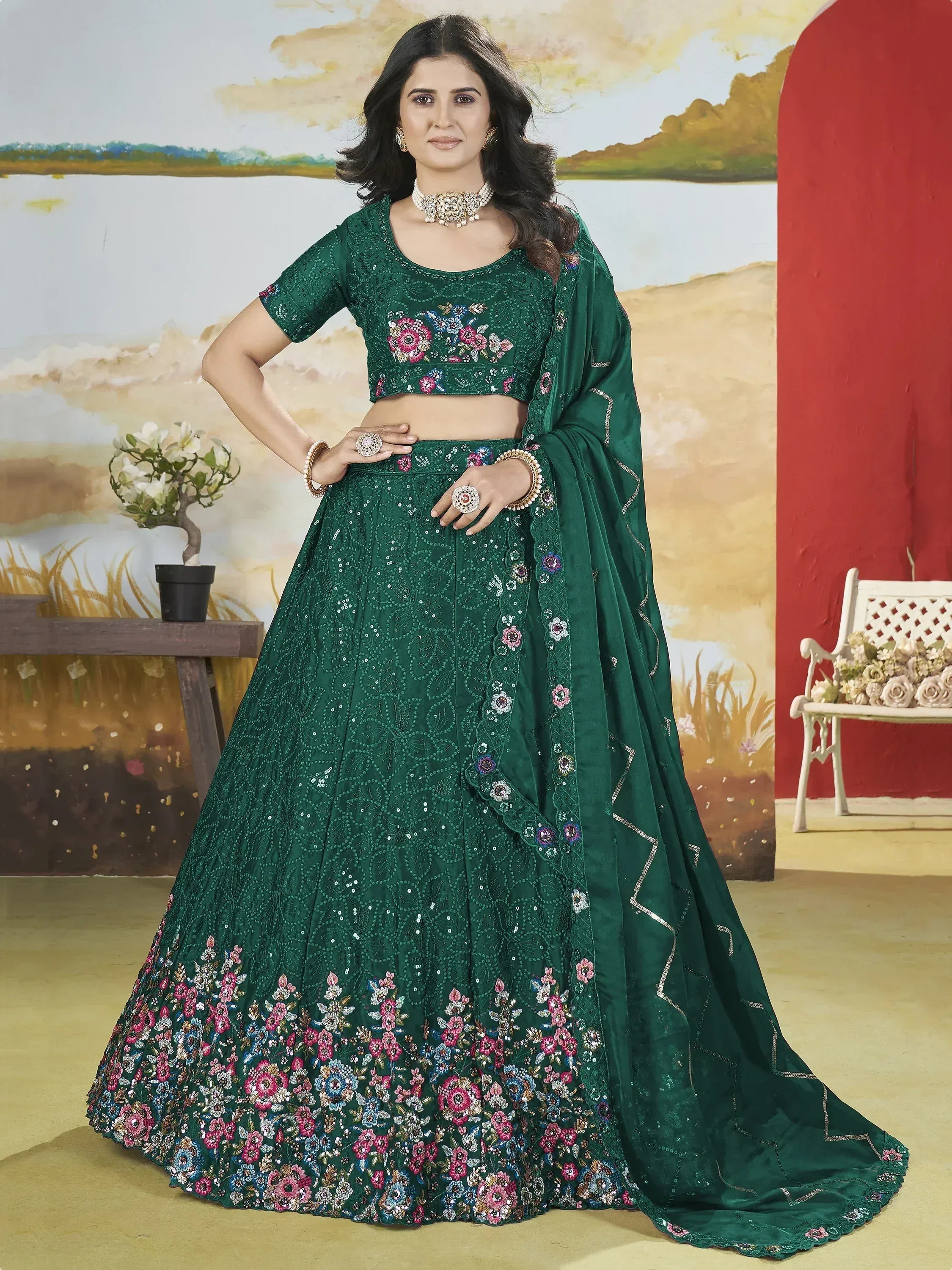 Emerald green embroidered lehenga choli with floral motifs and sequin work, perfect for Indian ethnic occasions