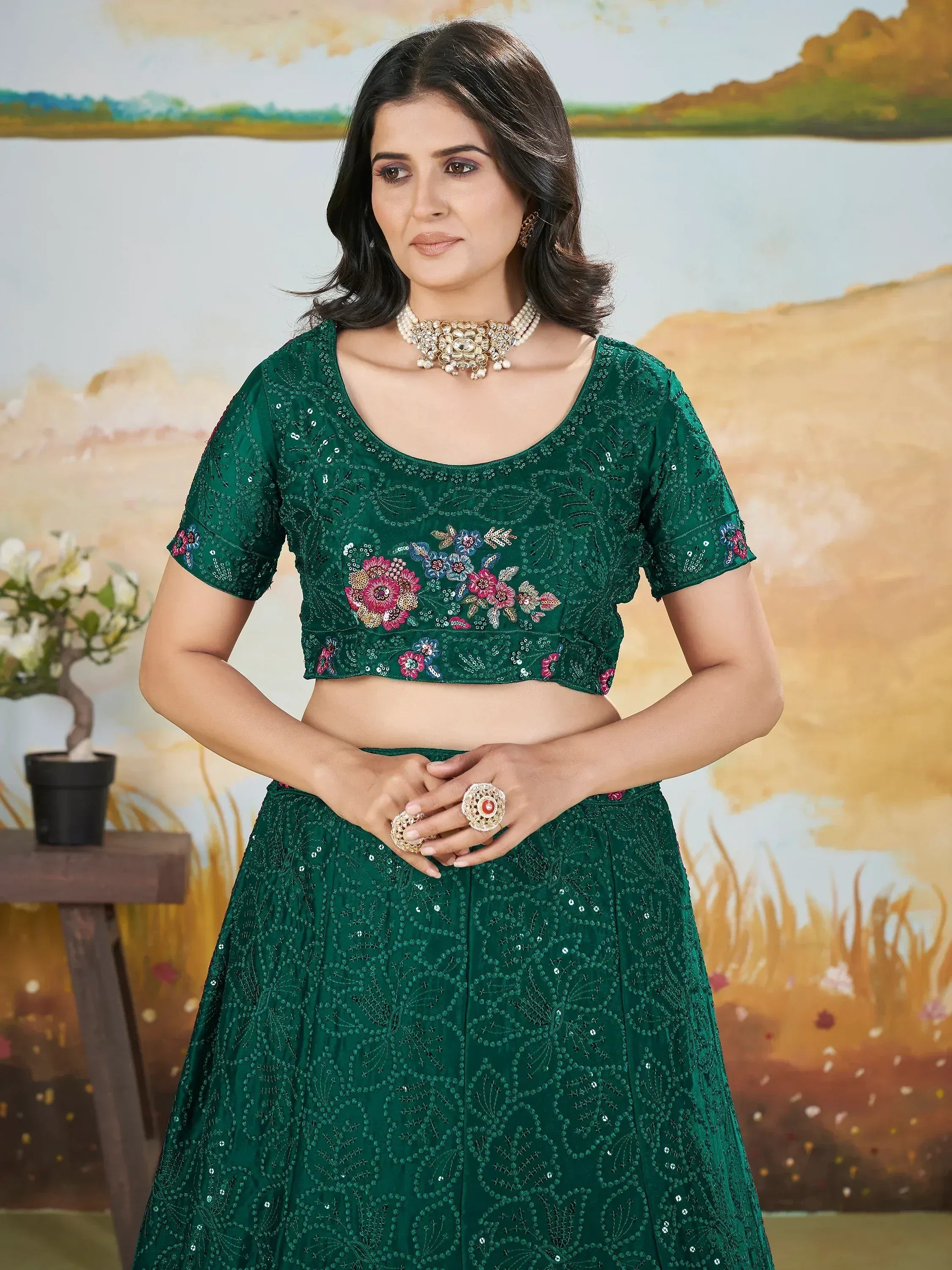 Emerald green embroidered lehenga choli with floral sequin work, perfect for Indian ethnic wear occasions.