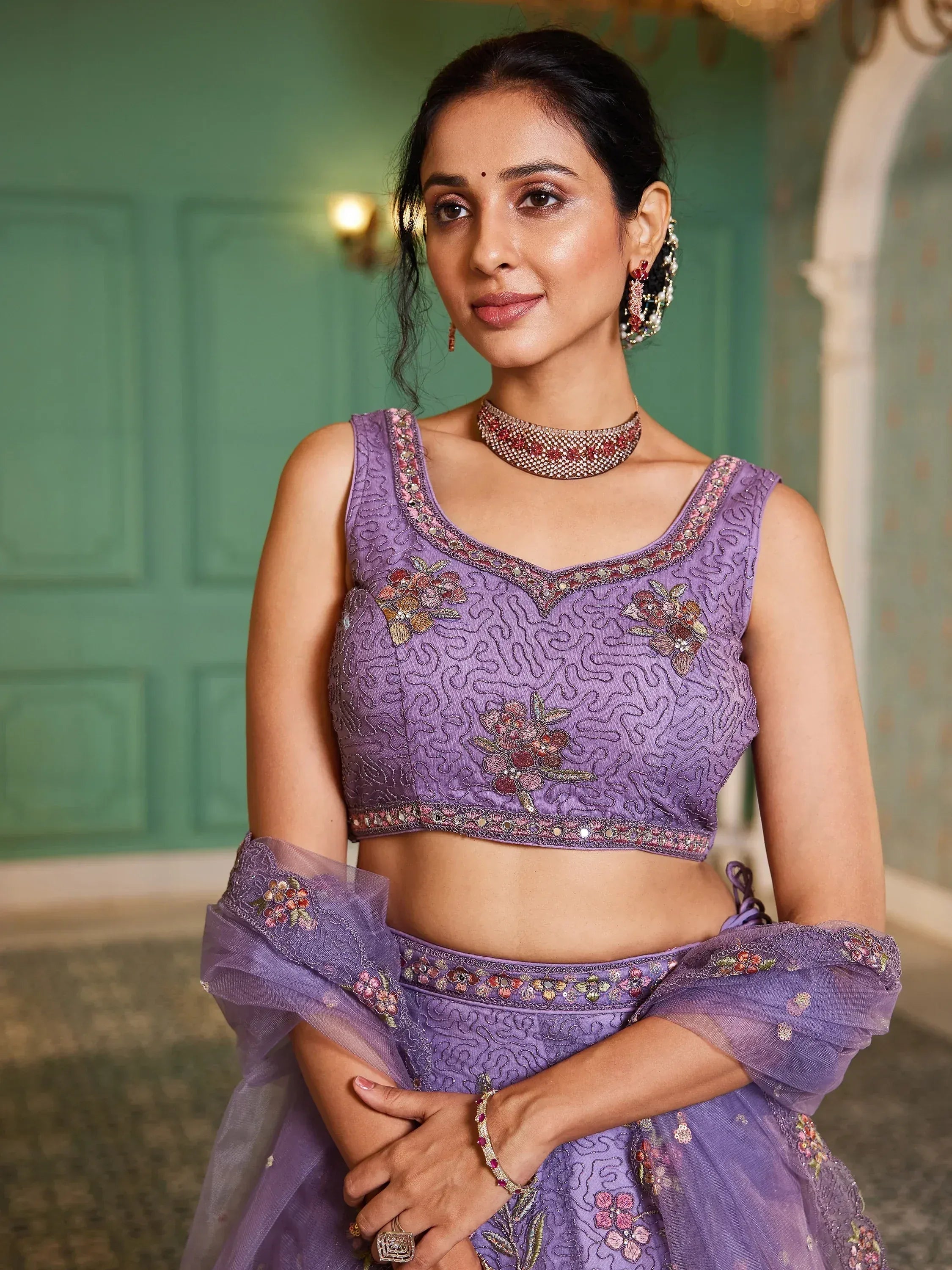 Purple embroidered lehenga choli with floral detailing, perfect for Indian ethnic wear occasions