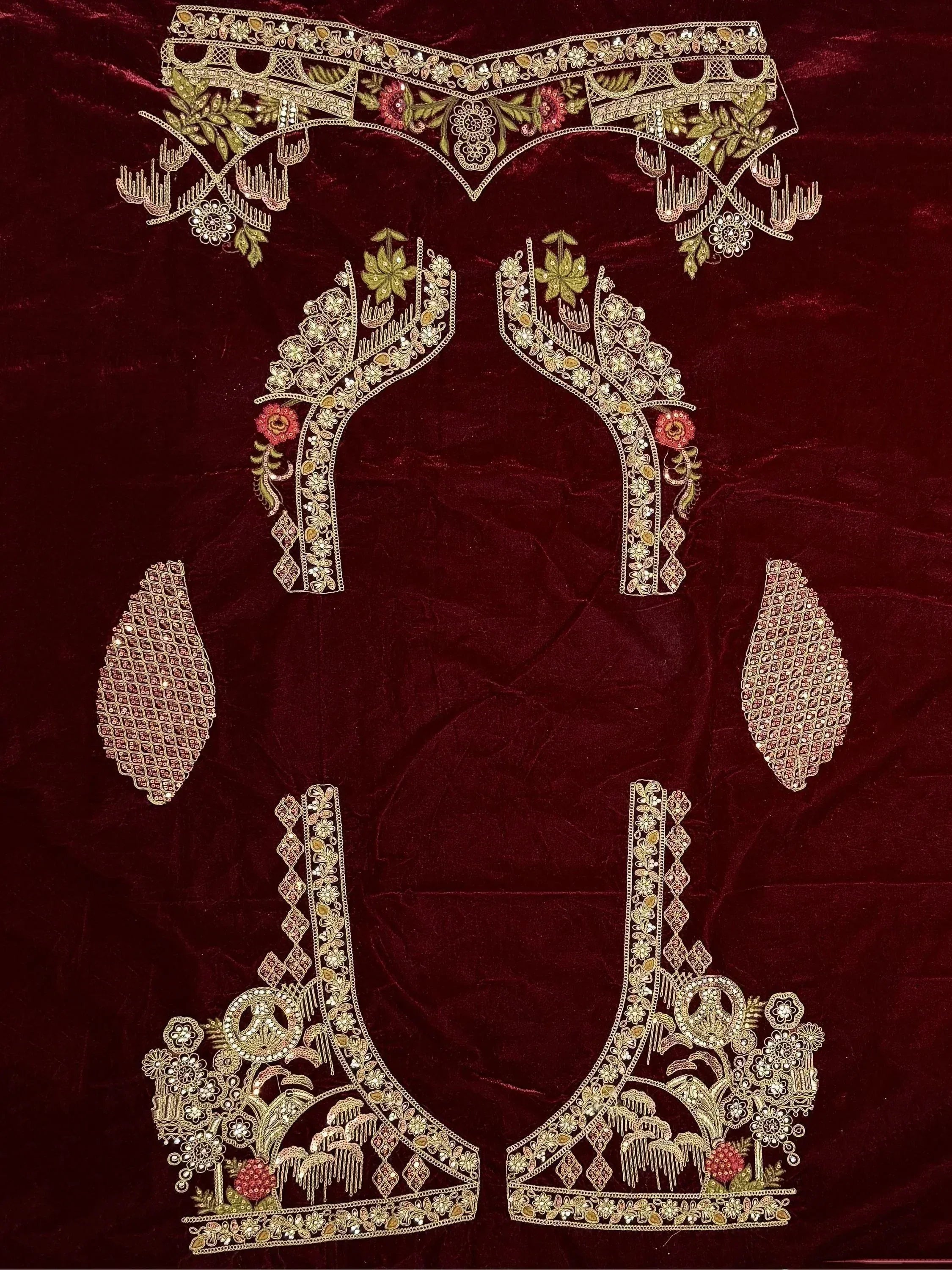 Luxury Indian ethnic wear embroidery set with floral gold zari on maroon velvet, perfect for designer lehenga choli or saree.
