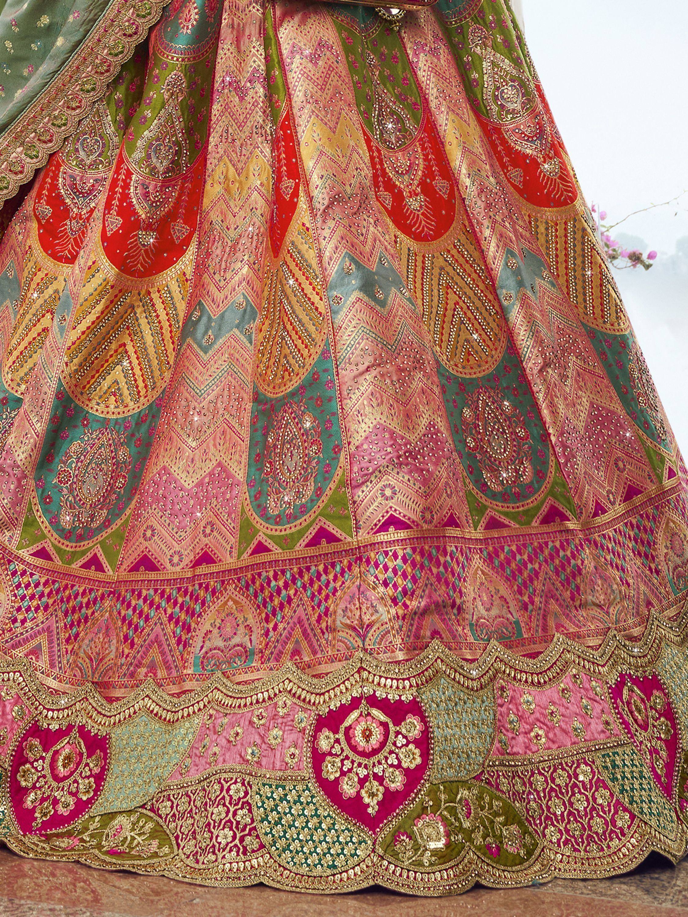 Designer lehenga choli with intricate paisley and geometric embroidery in vibrant colors