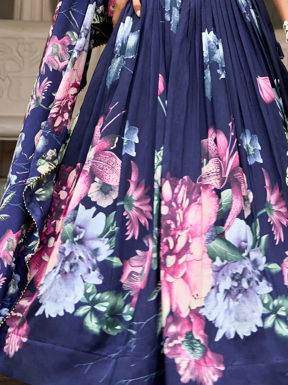 Navy blue floral printed lehenga with vibrant pink and white blooms, perfect for ethnic occasions