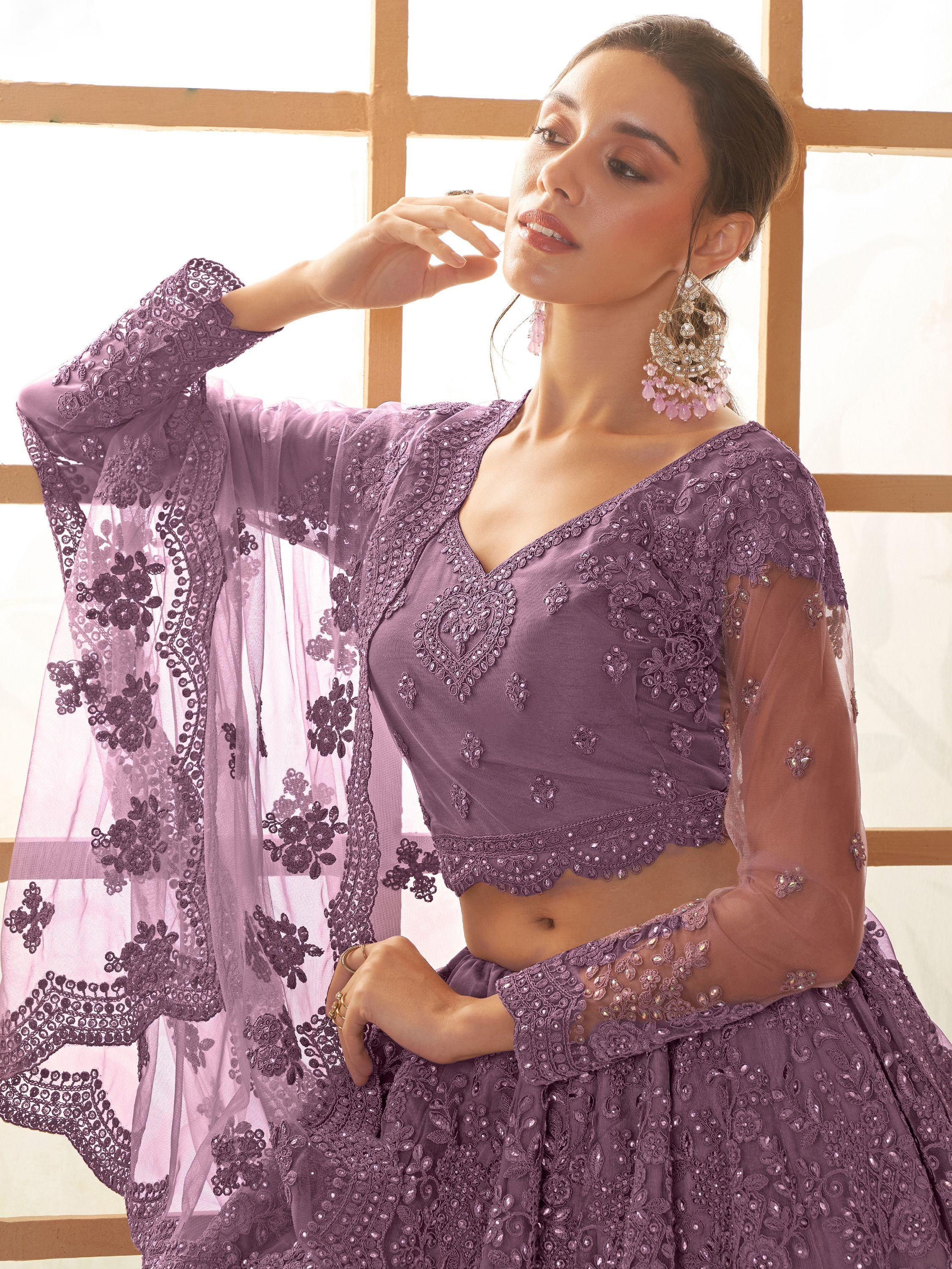 Purple embroidered lehenga choli with sheer sleeves, perfect for Indian ethnic wear and festive occasions.