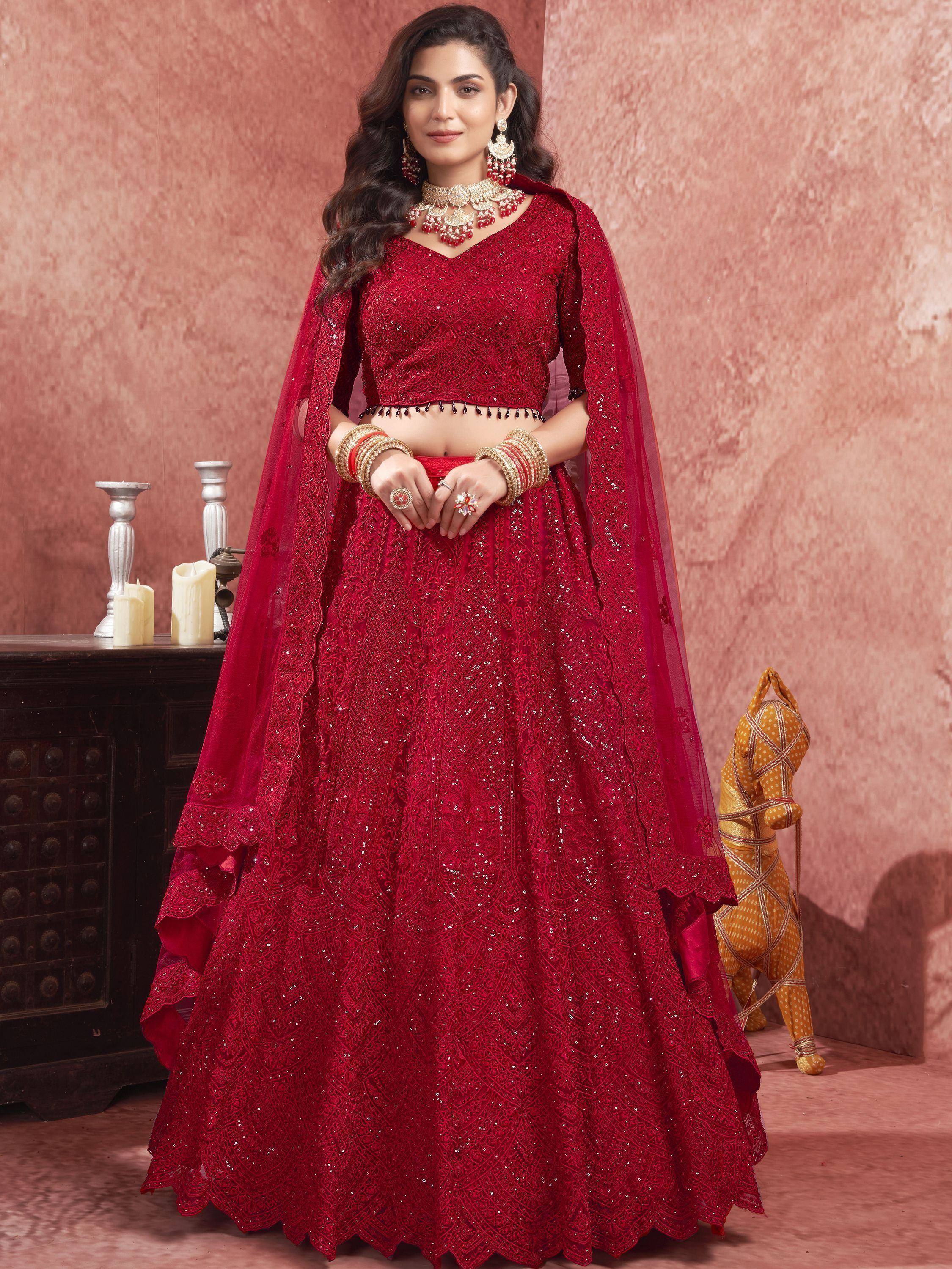 Red embroidered lehenga choli with dupatta, perfect for Indian weddings and festive occasions
