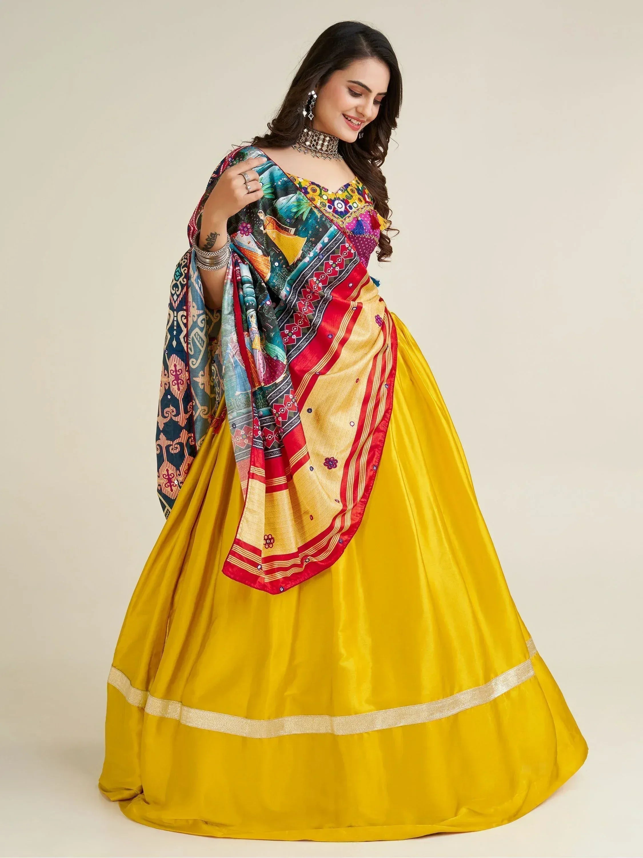 Vibrant yellow lehenga choli with colorful printed dupatta, perfect for Indian ethnic wear occasions